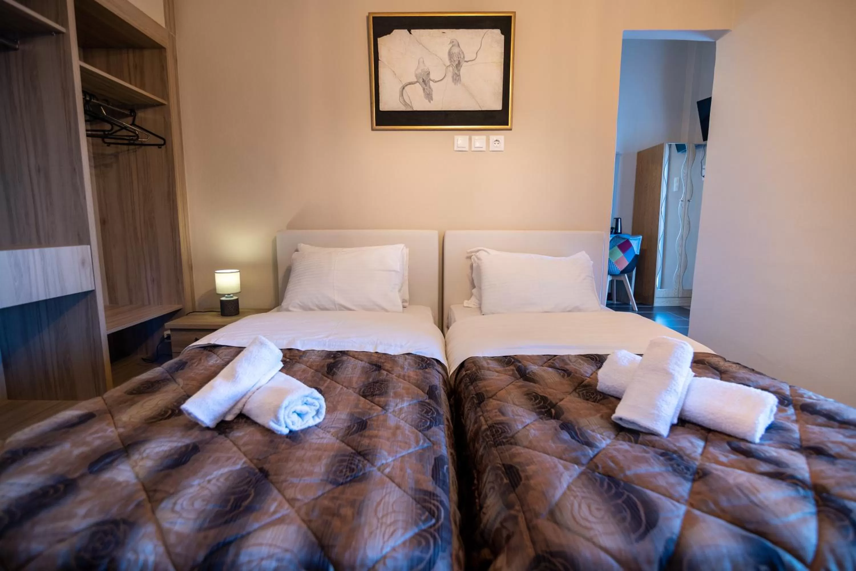 Bed in Votsalakia Hotel & Luxury Apartments
