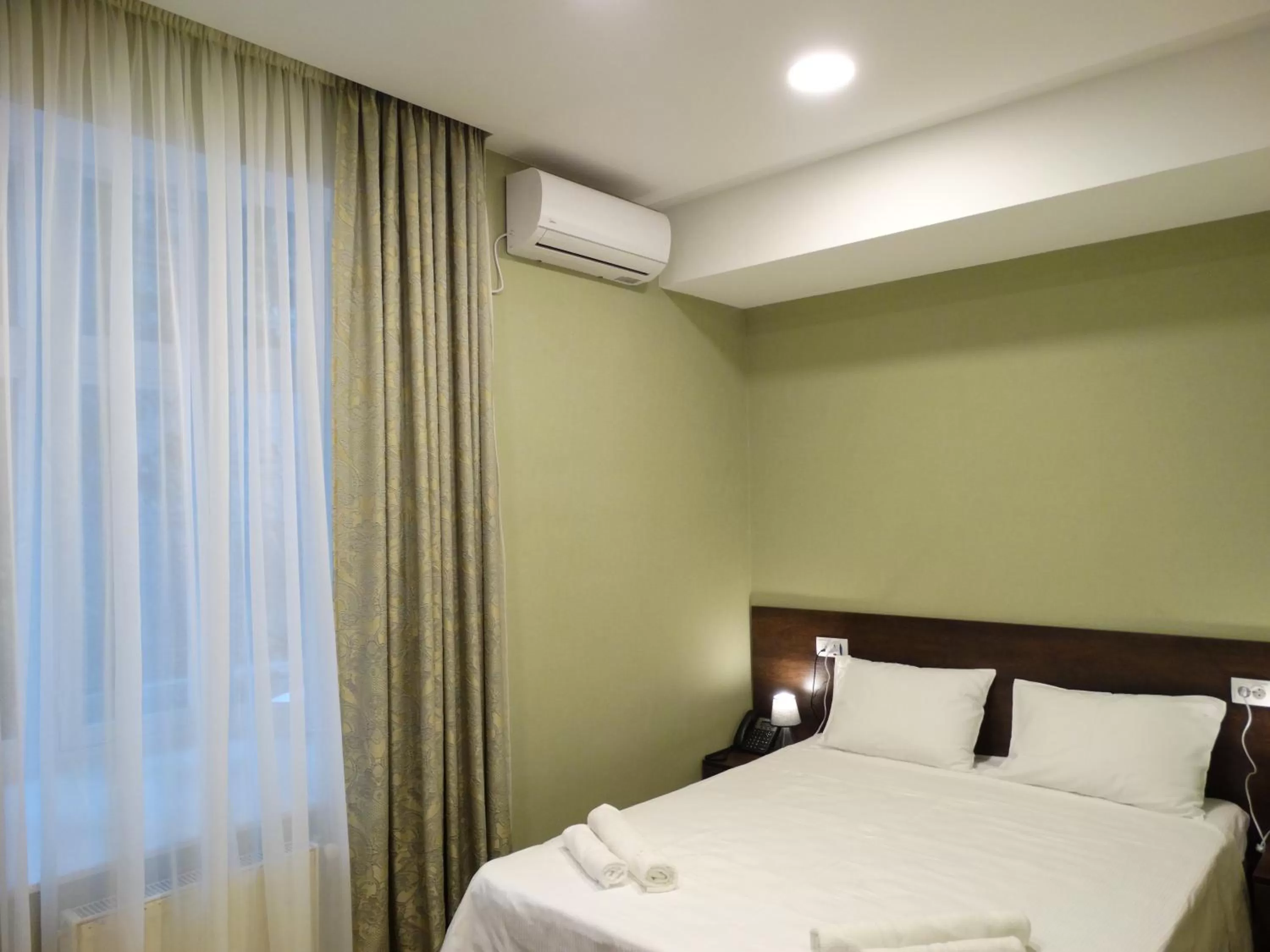 Bed in Hotel Boutique IVERIA