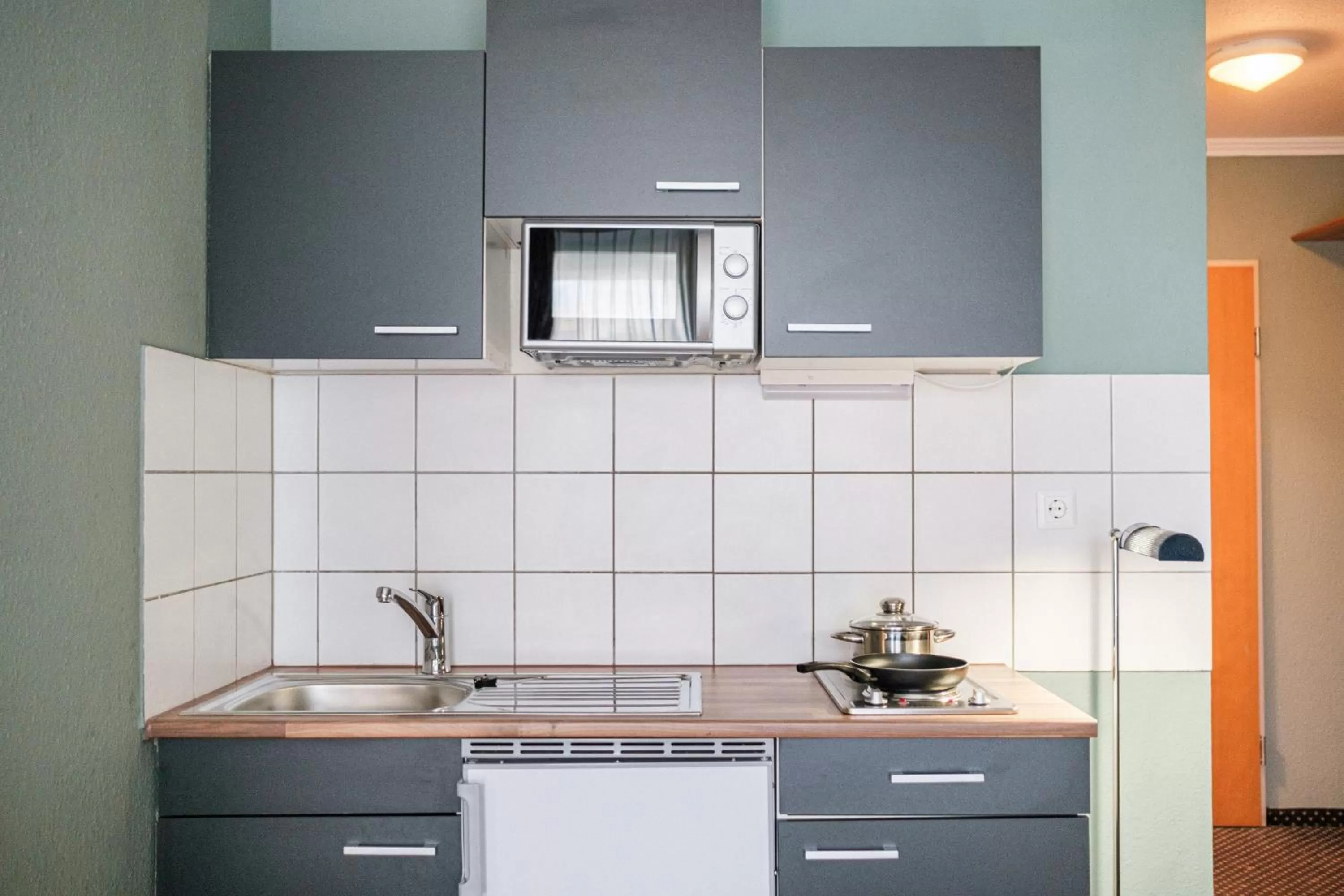 Kitchen or kitchenette in Mercure Hotel Pforzheim