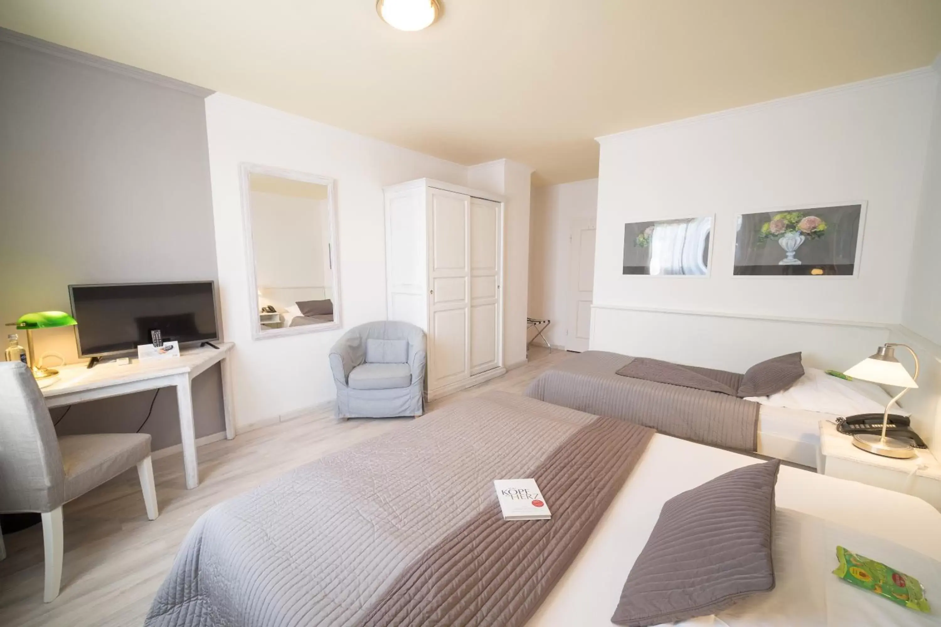 Comfort Triple Room - single occupancy in Hotel Toskana Comfort Triple Room - single occupancy in Hotel Toskana