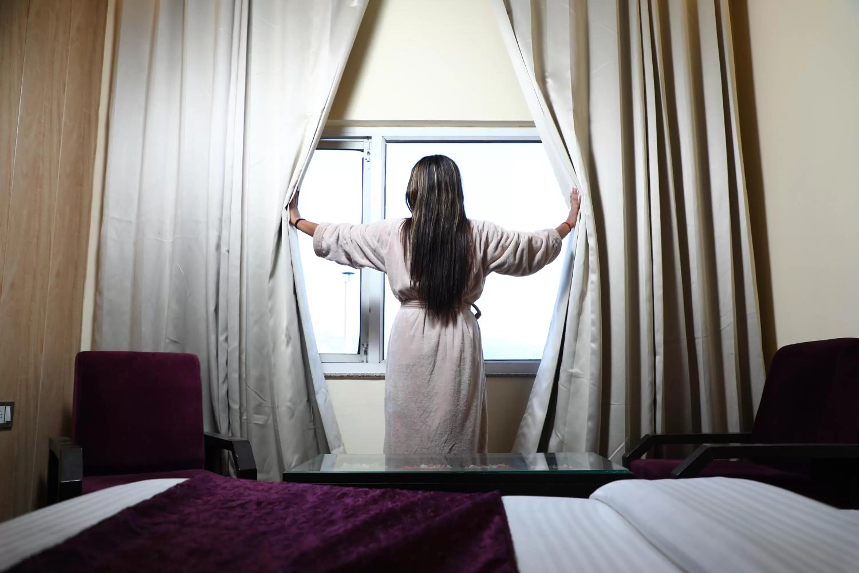 People, Bed in Perfectstayz Premium at Harkipauri Road - Ganga view rooftop cafe