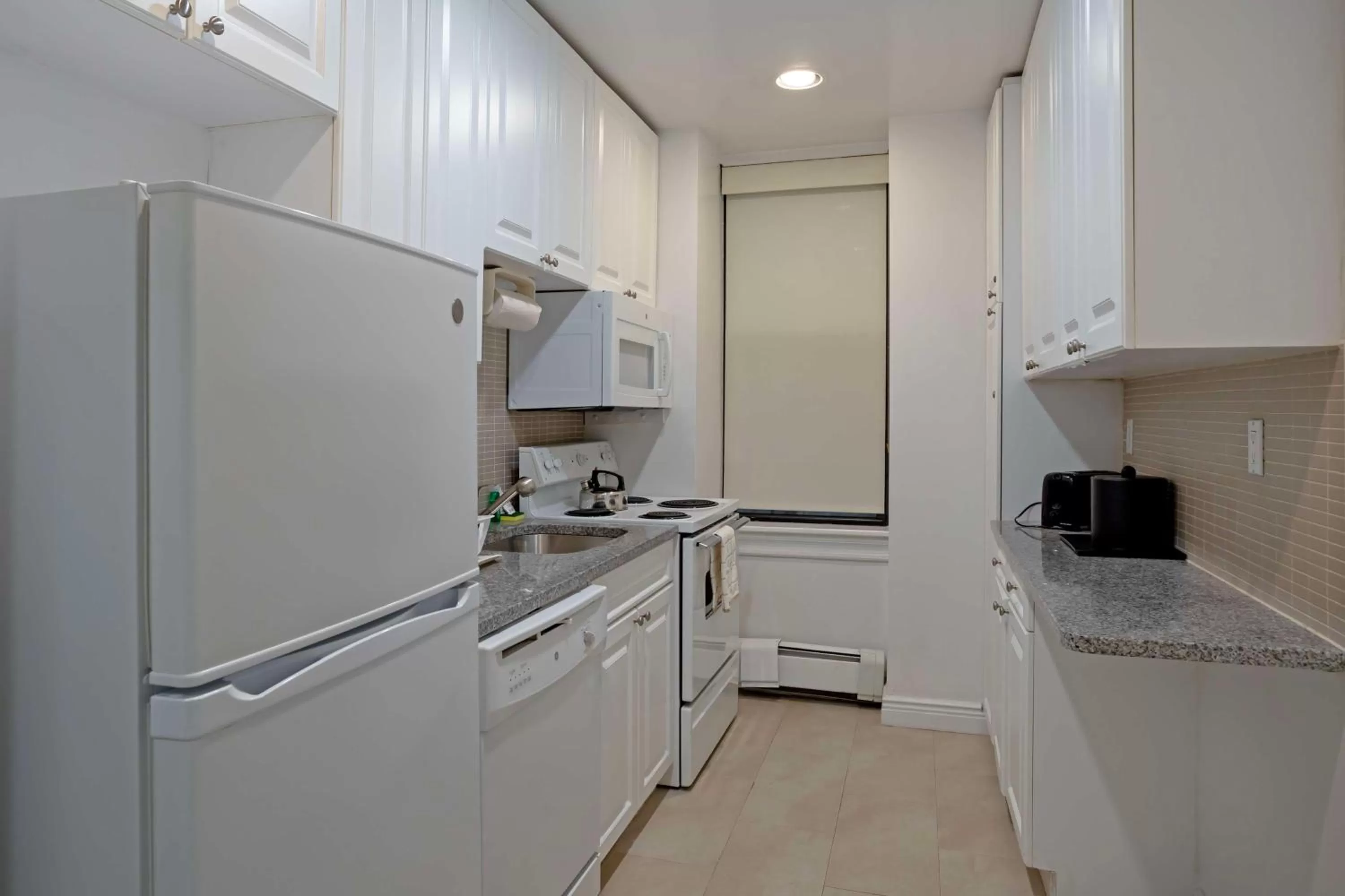 Bedroom in Best Western Plus Hospitality House Suites