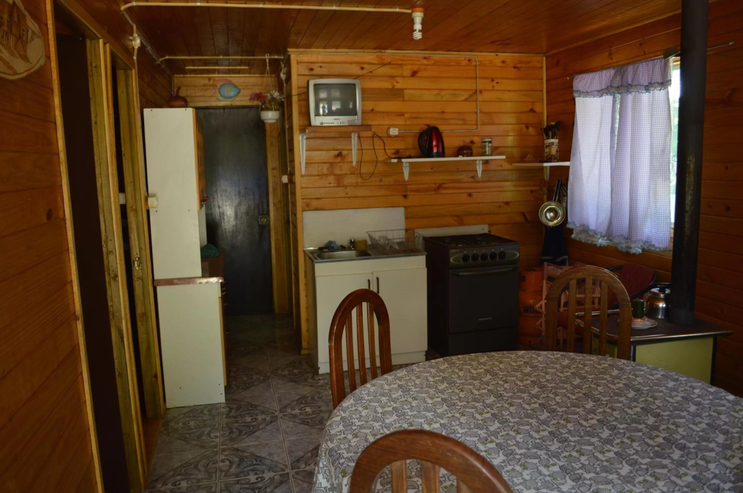Kitchen/Kitchenette in Coyunche Cabañas y Camping Laja & San Rosendo