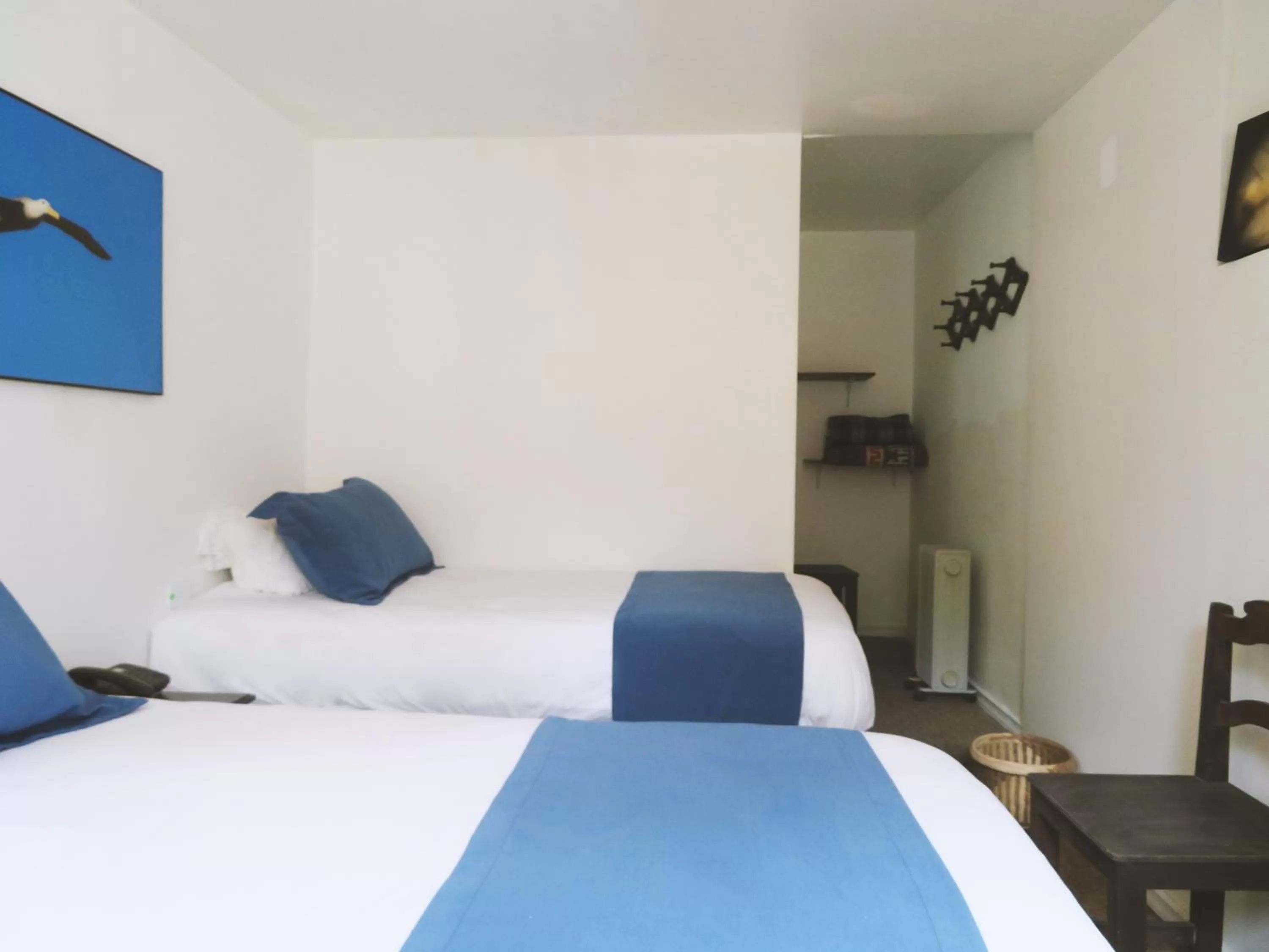 Bed in Bird Garden Guest House