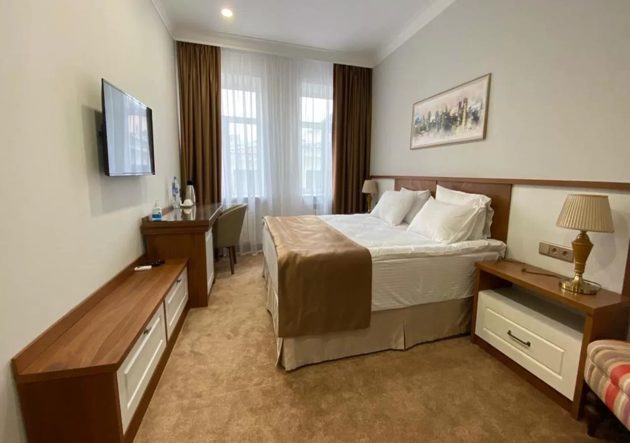 Bed in Boutique Hotel Kaspi