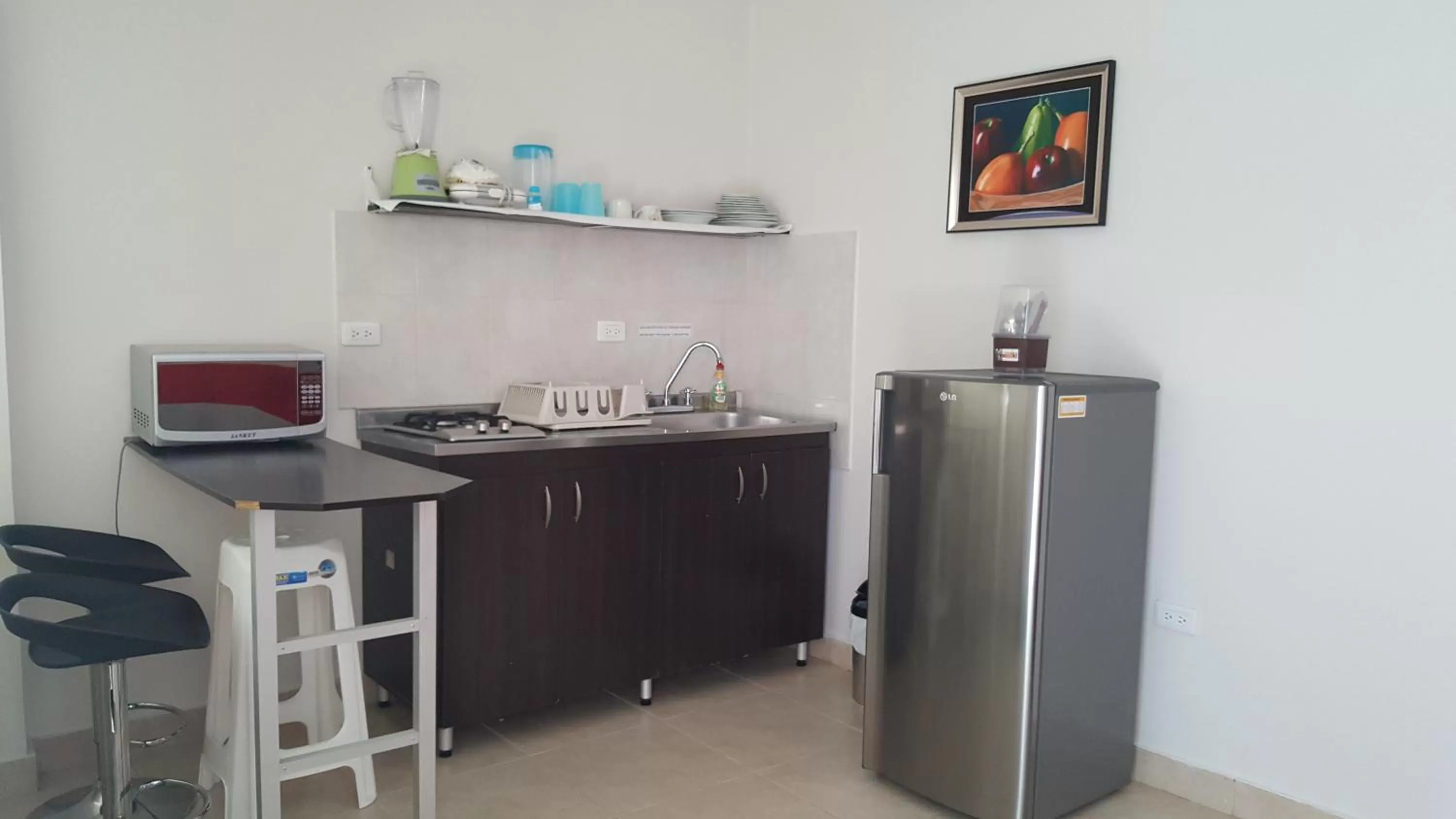 Kitchen/Kitchenette in Caribbean Island Hotel Piso 2