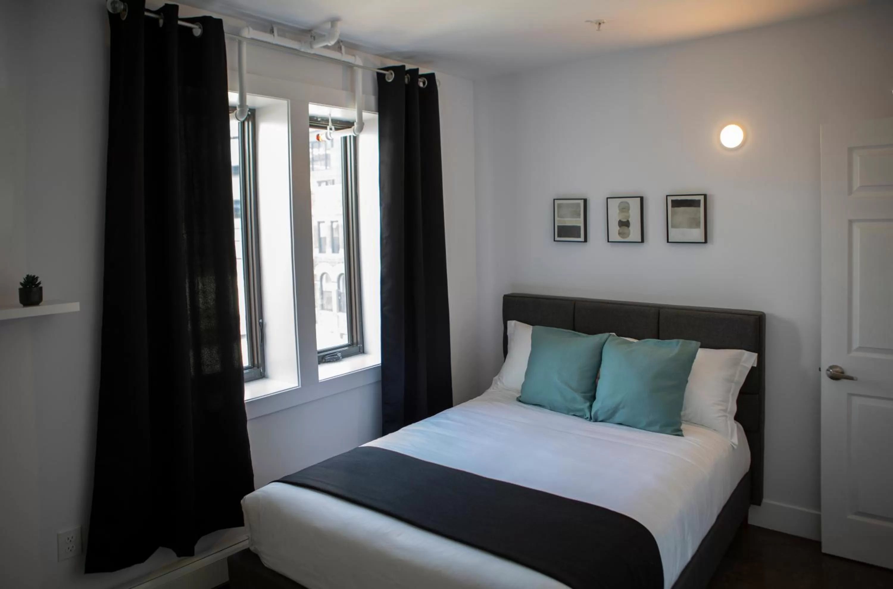 Bed in Cameo Hotel and Suites