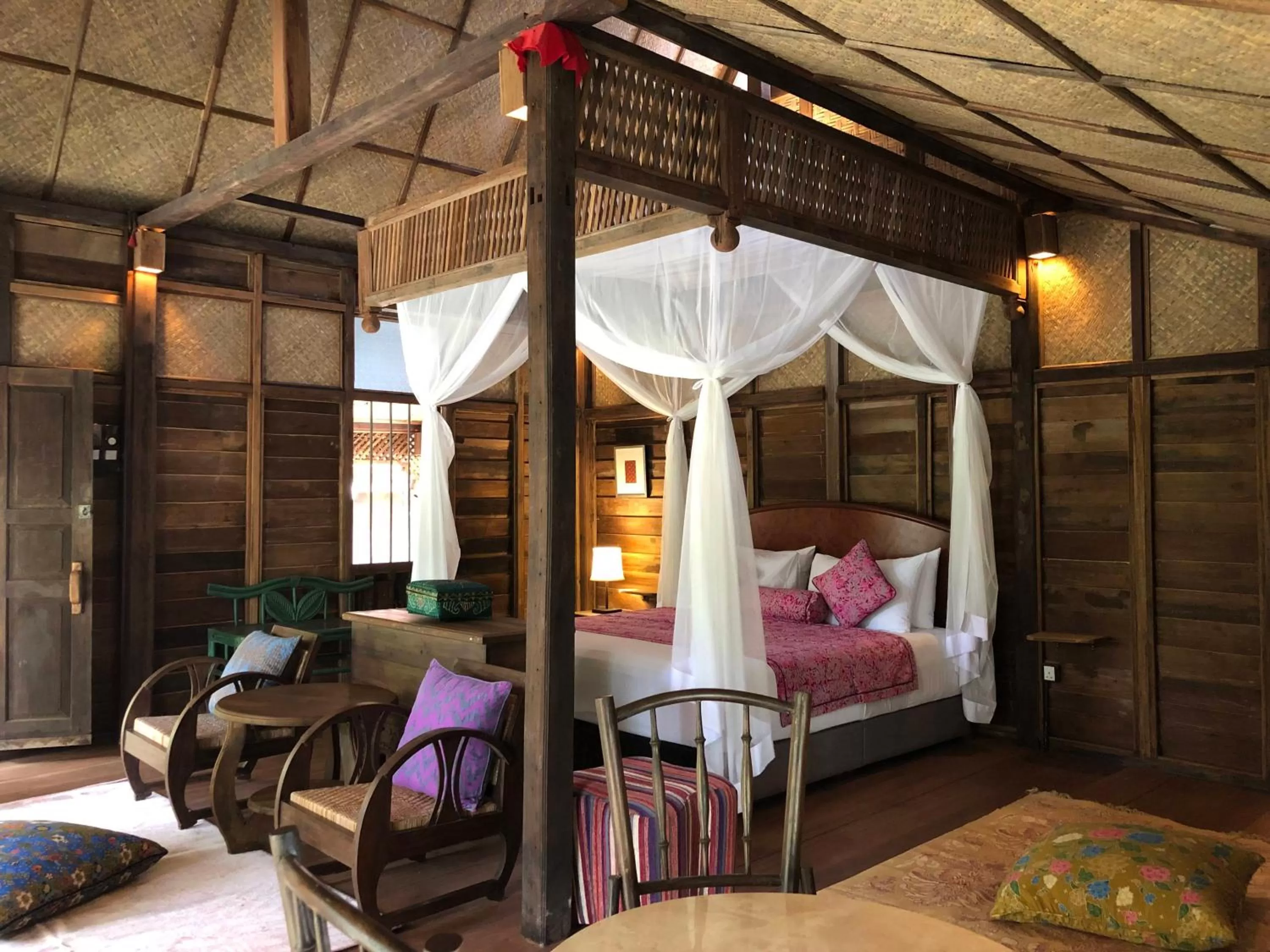 Bed in Kunang Kunang Heritage Villas