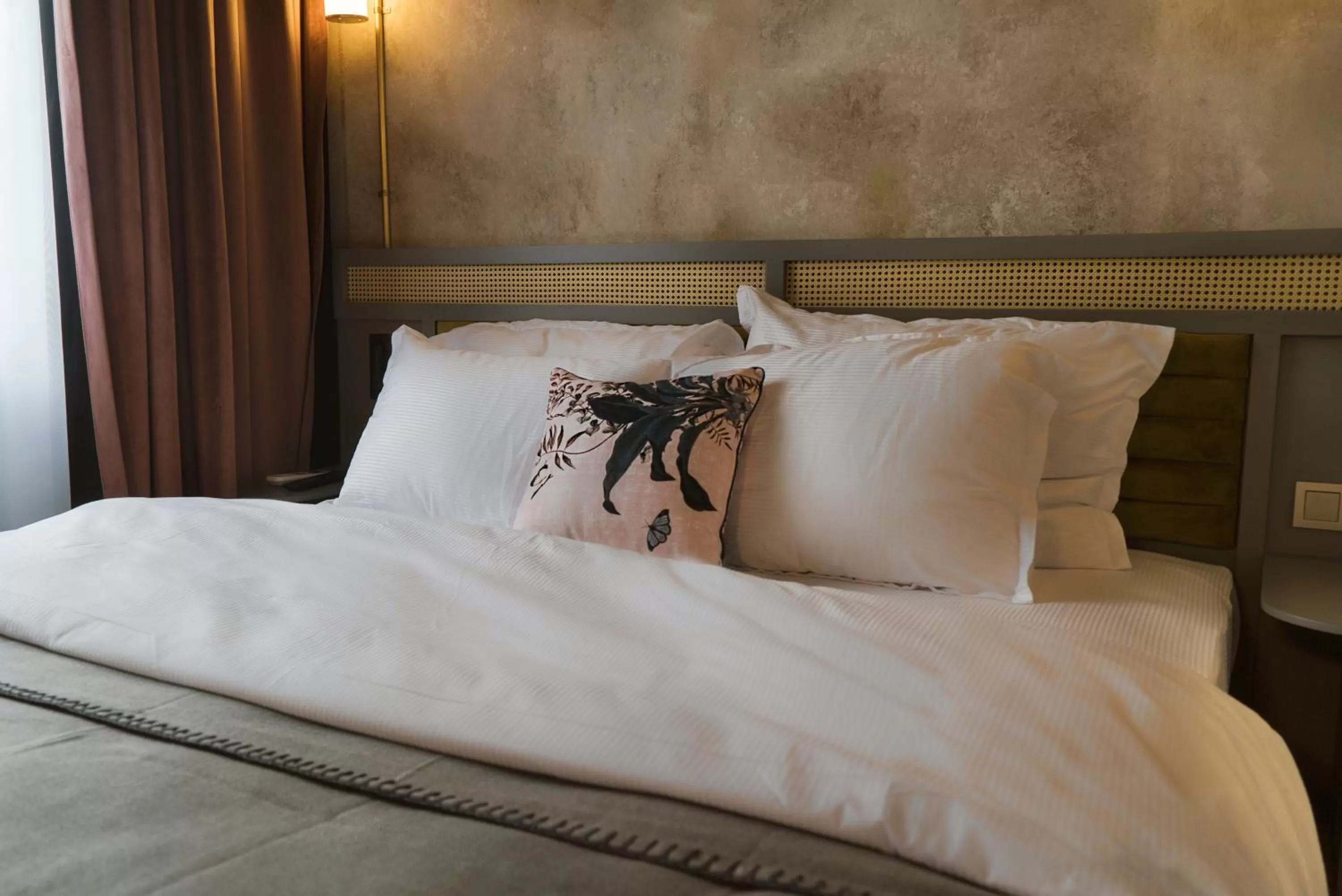 Bed in Magnova Vitality Boutique Hotel