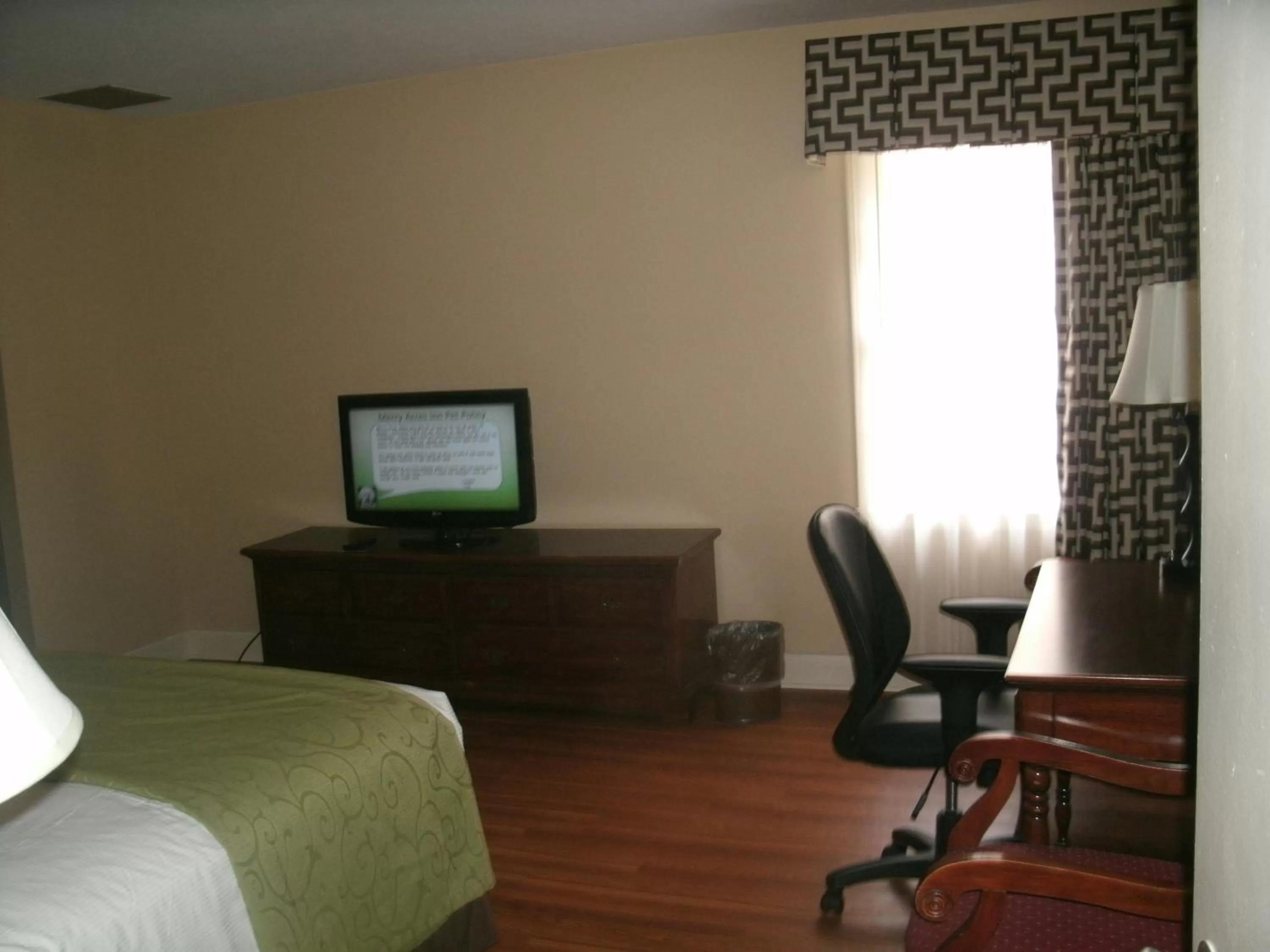 Bed in Merry Acres Inn