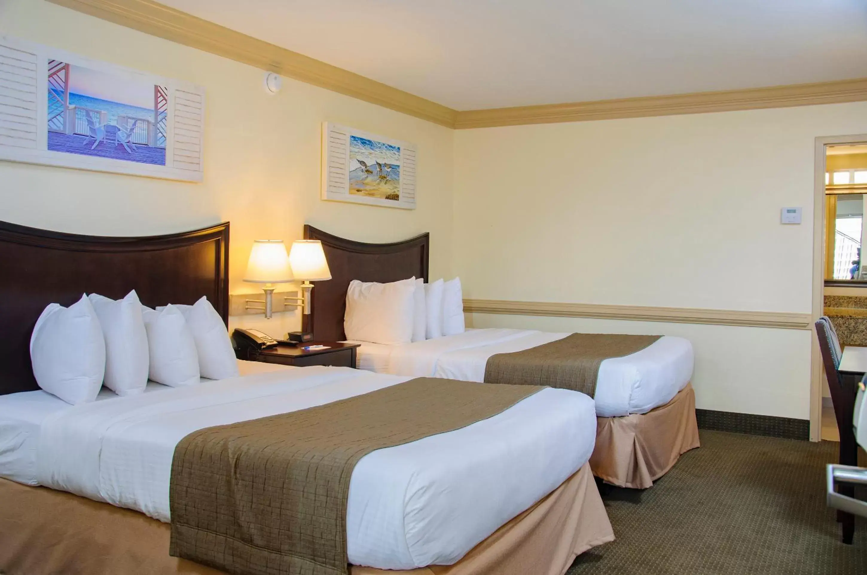 Disability Access/ Parking & Pool View with Two Queen Beds- Main Building in Shutters on the Banks Disability Access/ Parking & Pool View with Two Queen Beds- Main Building in Shutters on the Banks