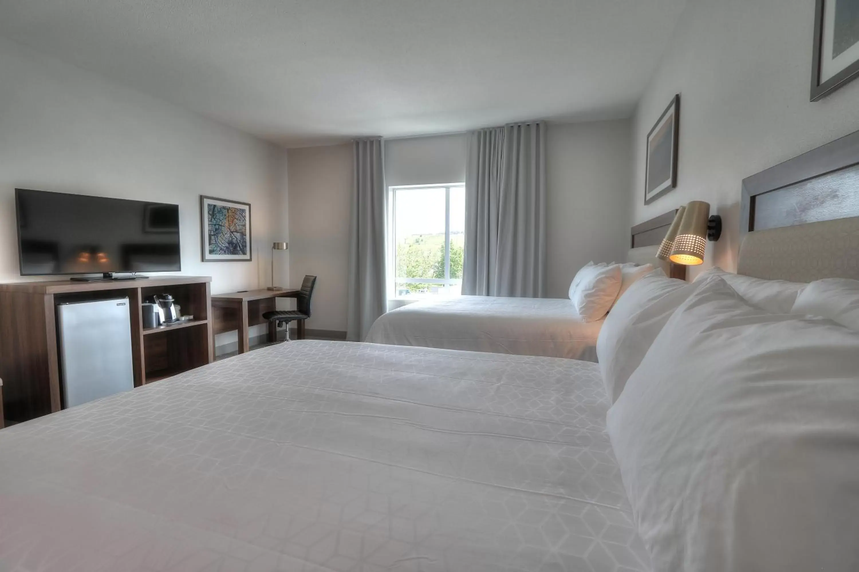 Queen Room with Two Queen Beds and Mobility Accessible Bathtub - Non-Smoking in Holiday Inn & Suites Pigeon Forge Convention Center by IHG Queen Room with Two Queen Beds and Mobility Accessible Bathtub - Non-Smoking in Holiday Inn & Suites Pigeon Forge Convention Center by IHG