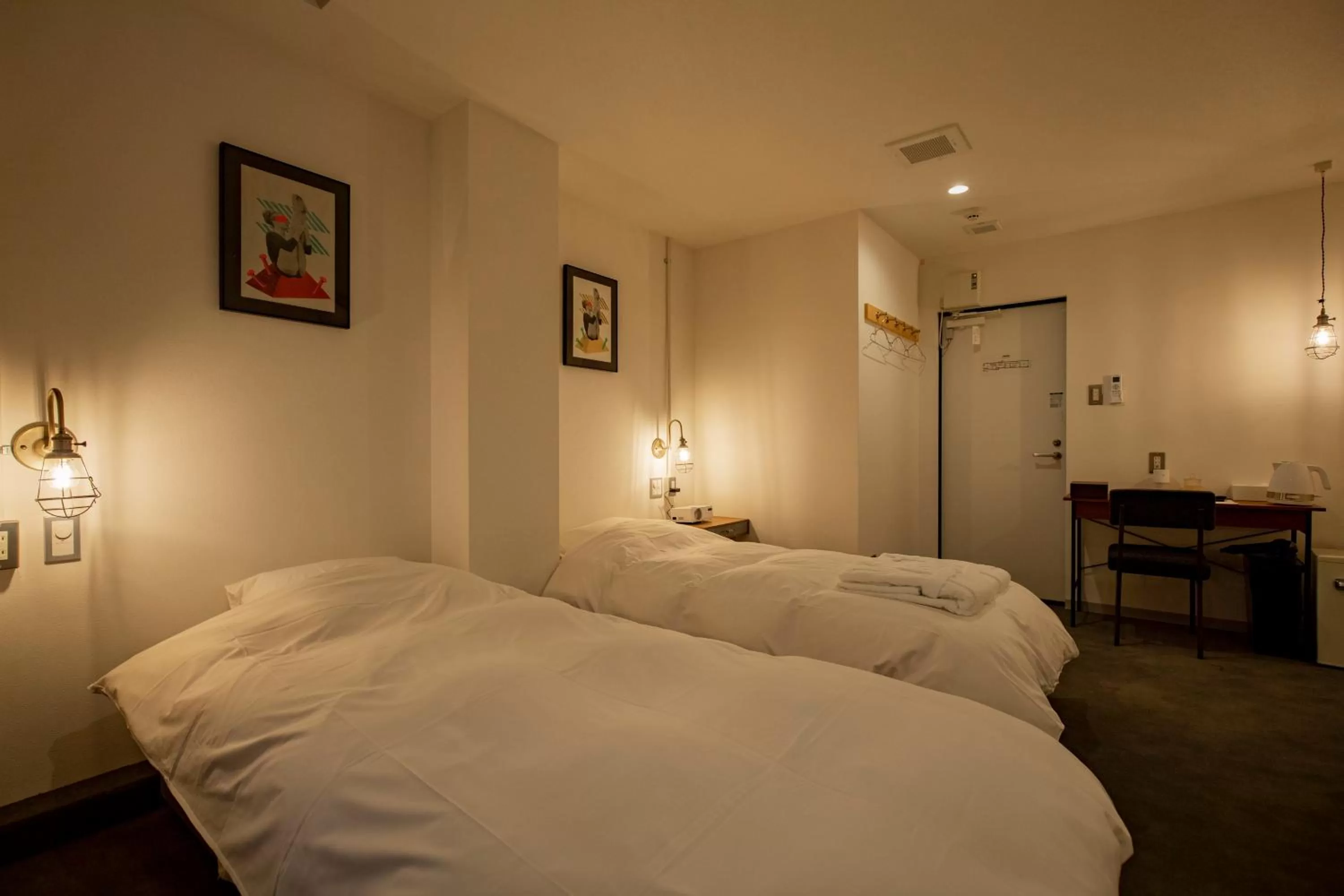 Bed in BENJAMIN HOTEL KANAZAWA