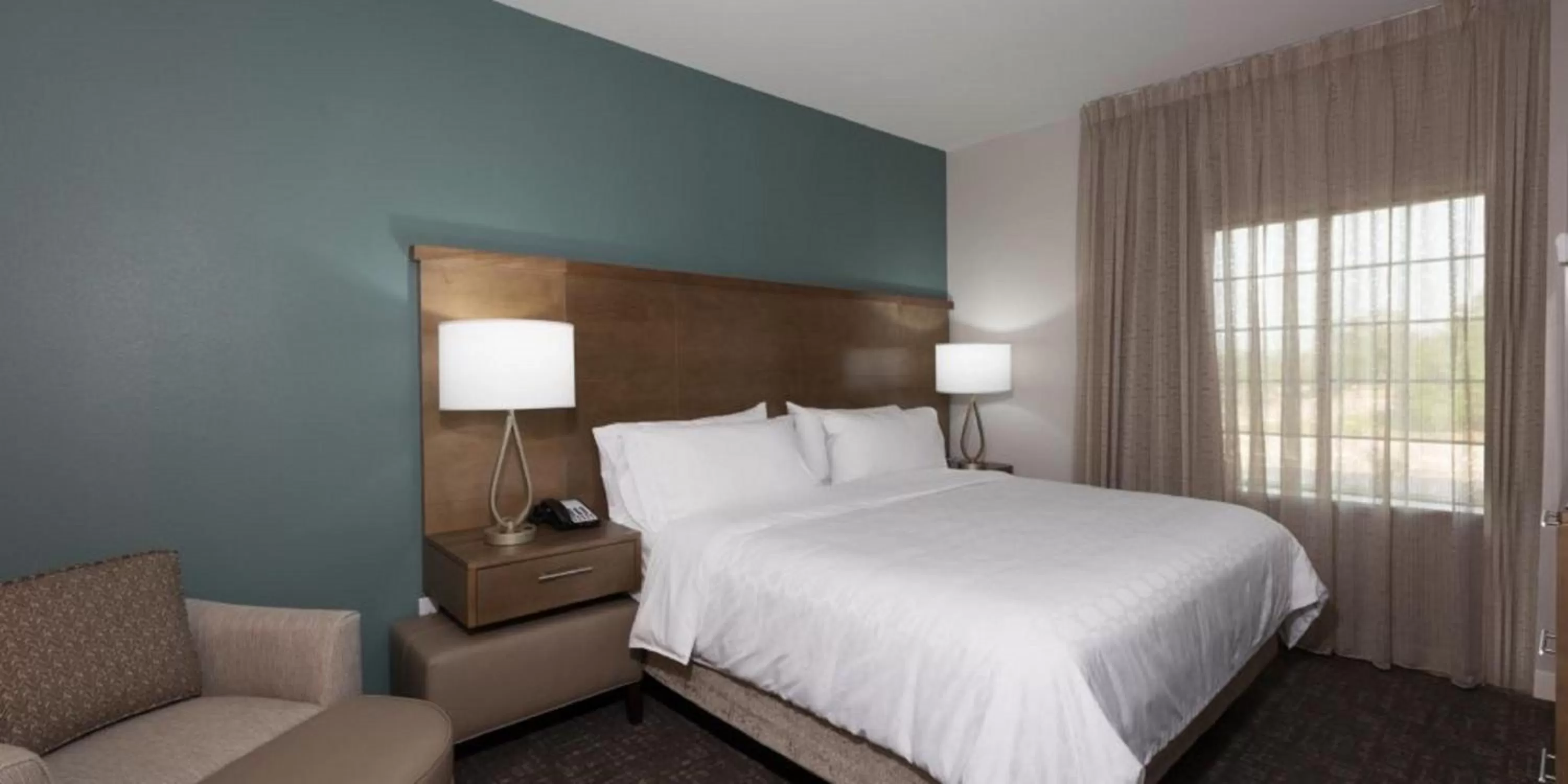 Photo of the whole room, Bed in Staybridge Suites Houston East - Baytown by IHG