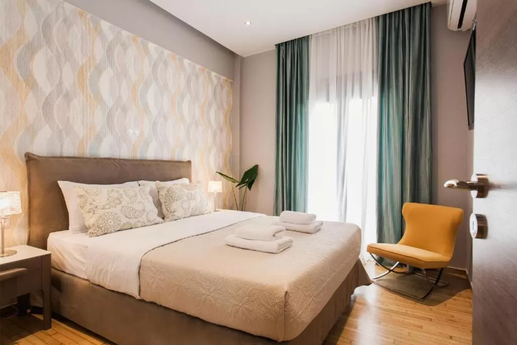 Bedroom, Bed in Nicholas Point Apartments and Rooms