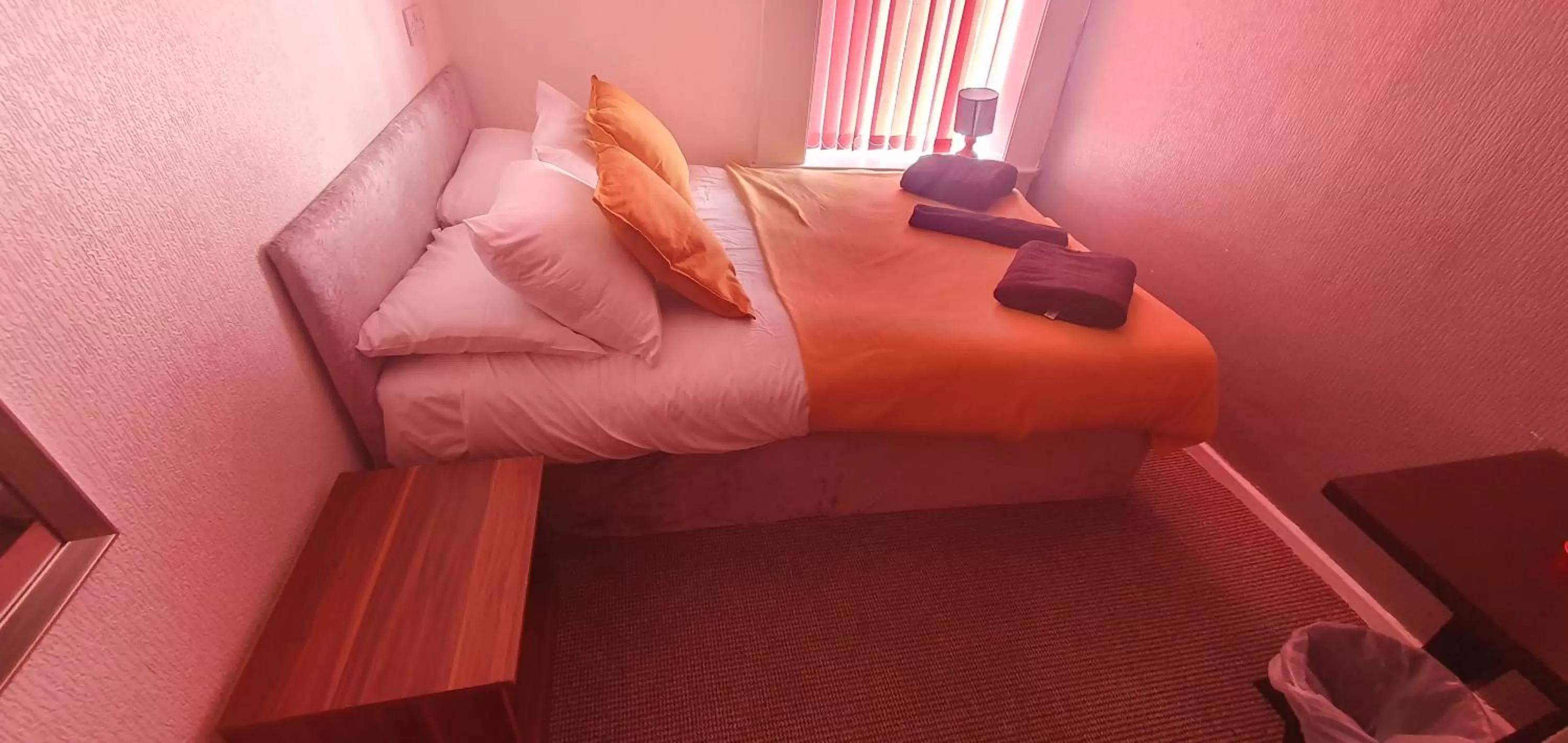 Bed in Palm Beach Hotel by the Sea