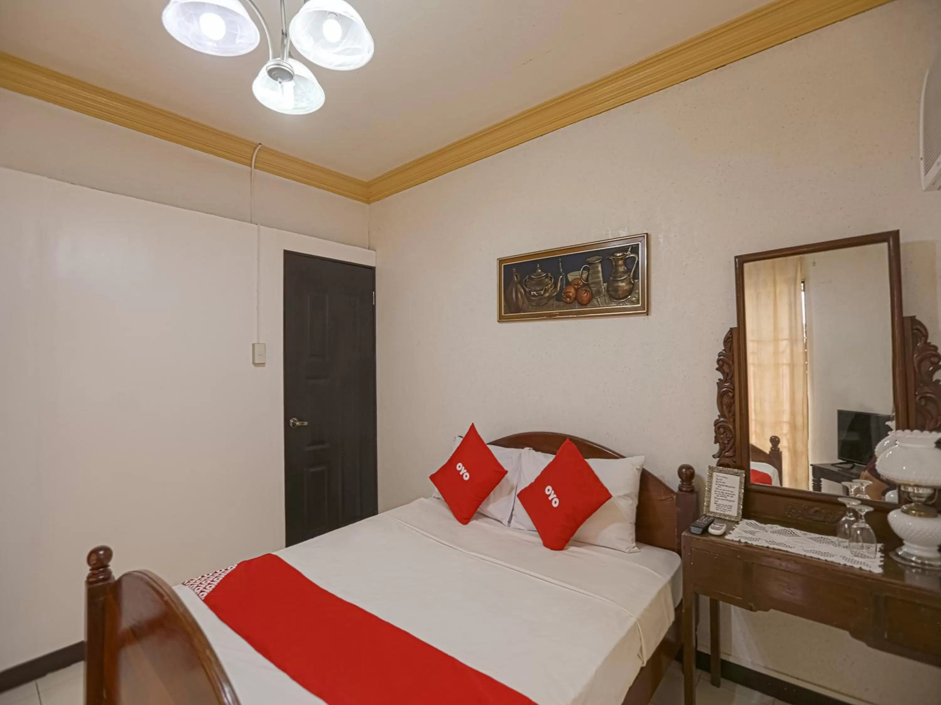 Bedroom, Bed in OYO 784 Laura's Garden Resort