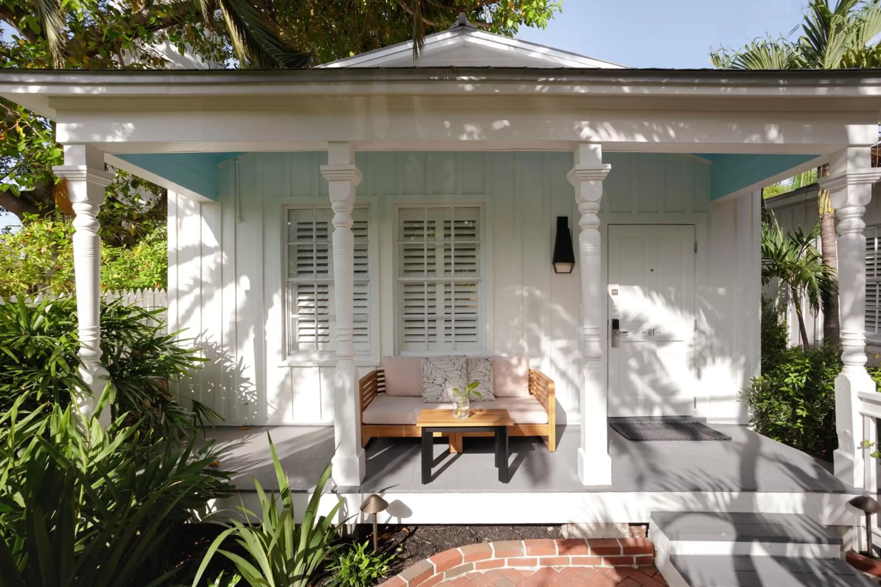 Essential Queen Room with Patio in Lighthouse Hotel - Key West Historic Inns Essential Queen Room with Patio in Lighthouse Hotel - Key West Historic Inns