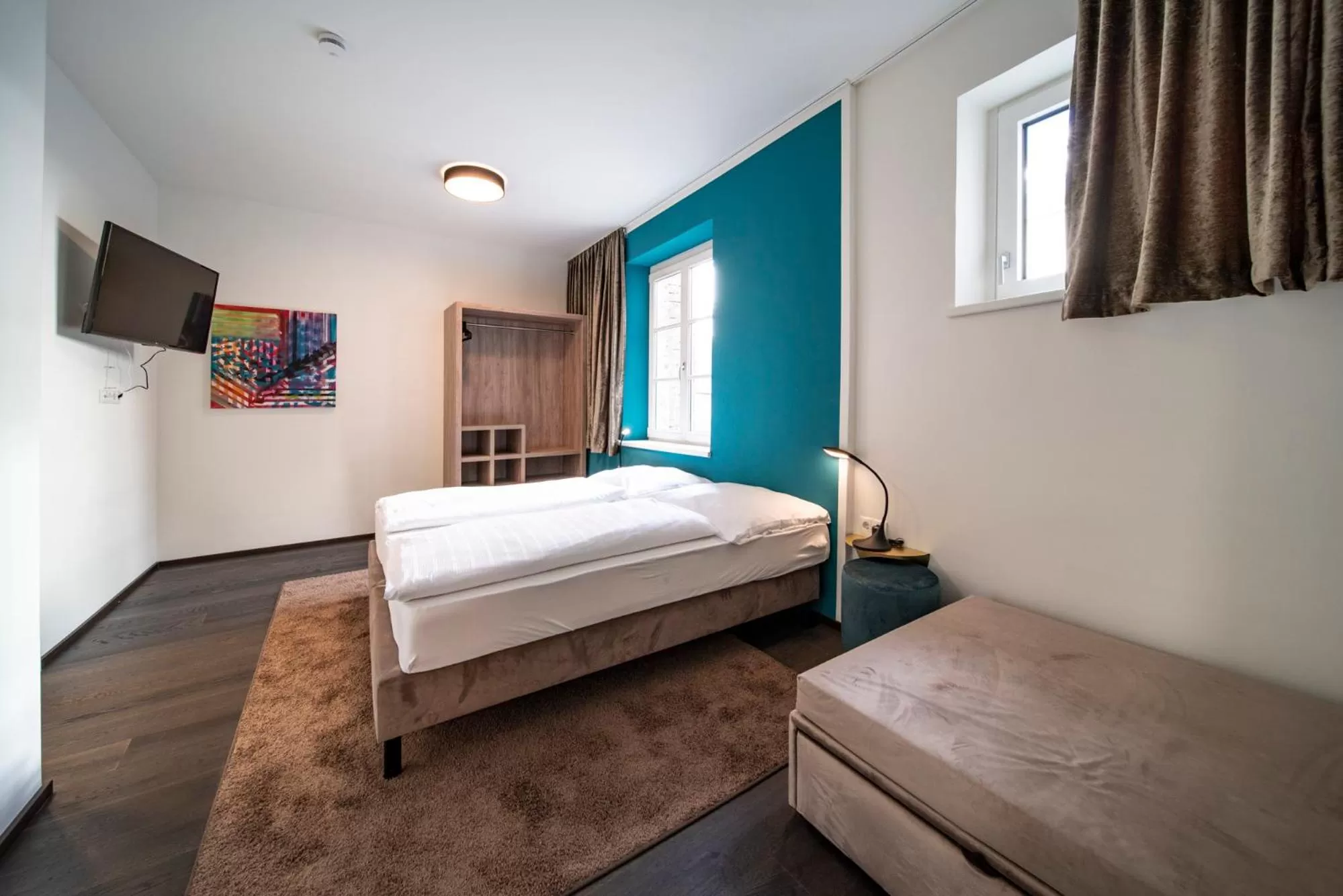 Bed in Blackhome Innsbruck Boutique I contactless check-in