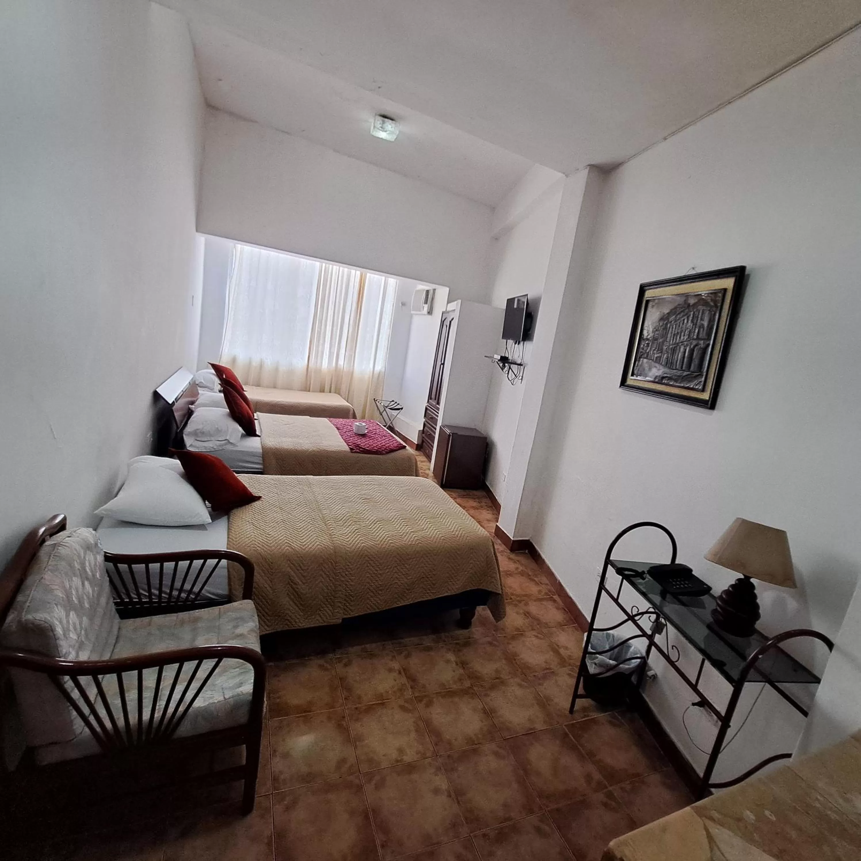 Photo of the whole room, Bed in Atlantic Suites Hotel