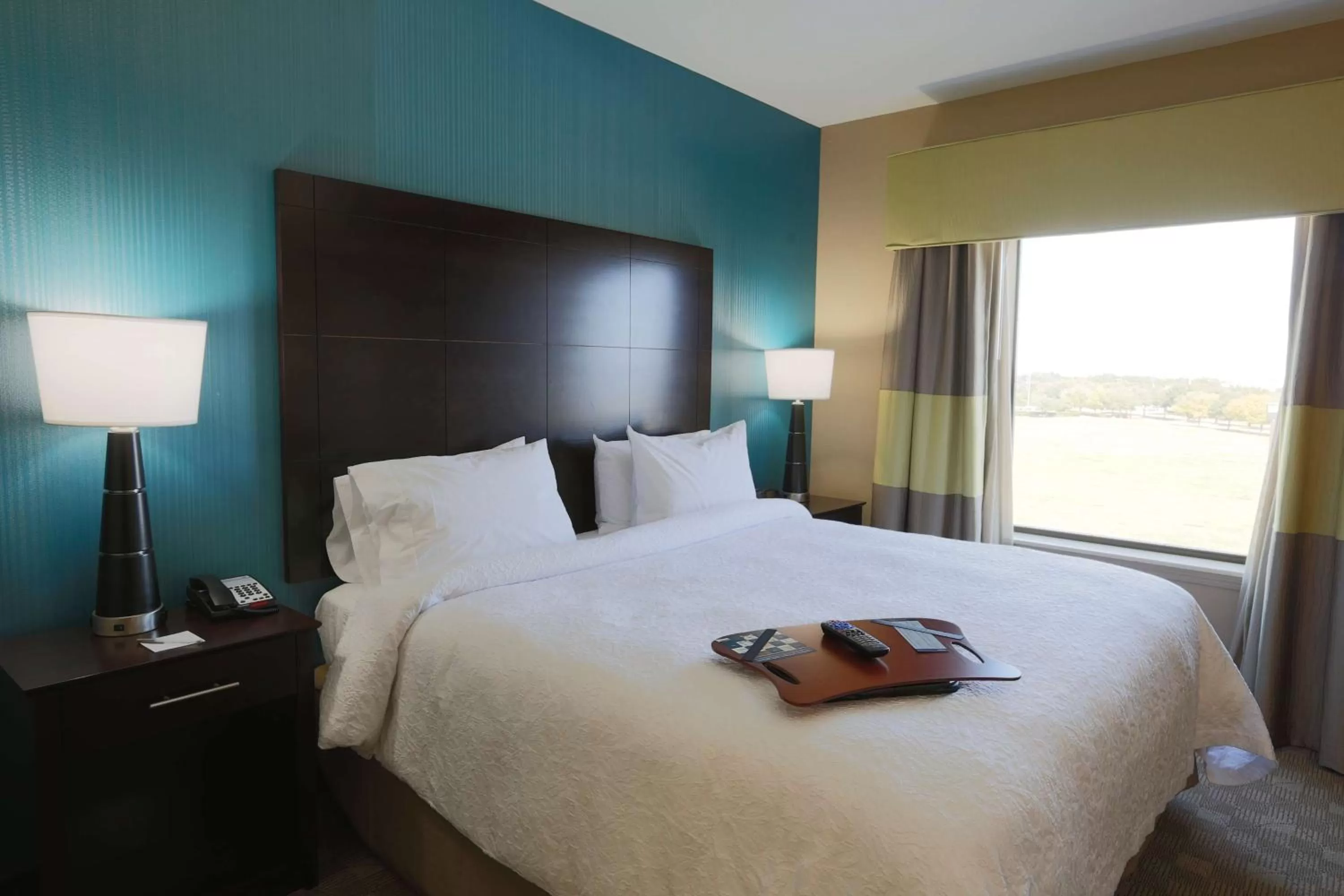 Bed in Hampton Inn and Suites Missouri City