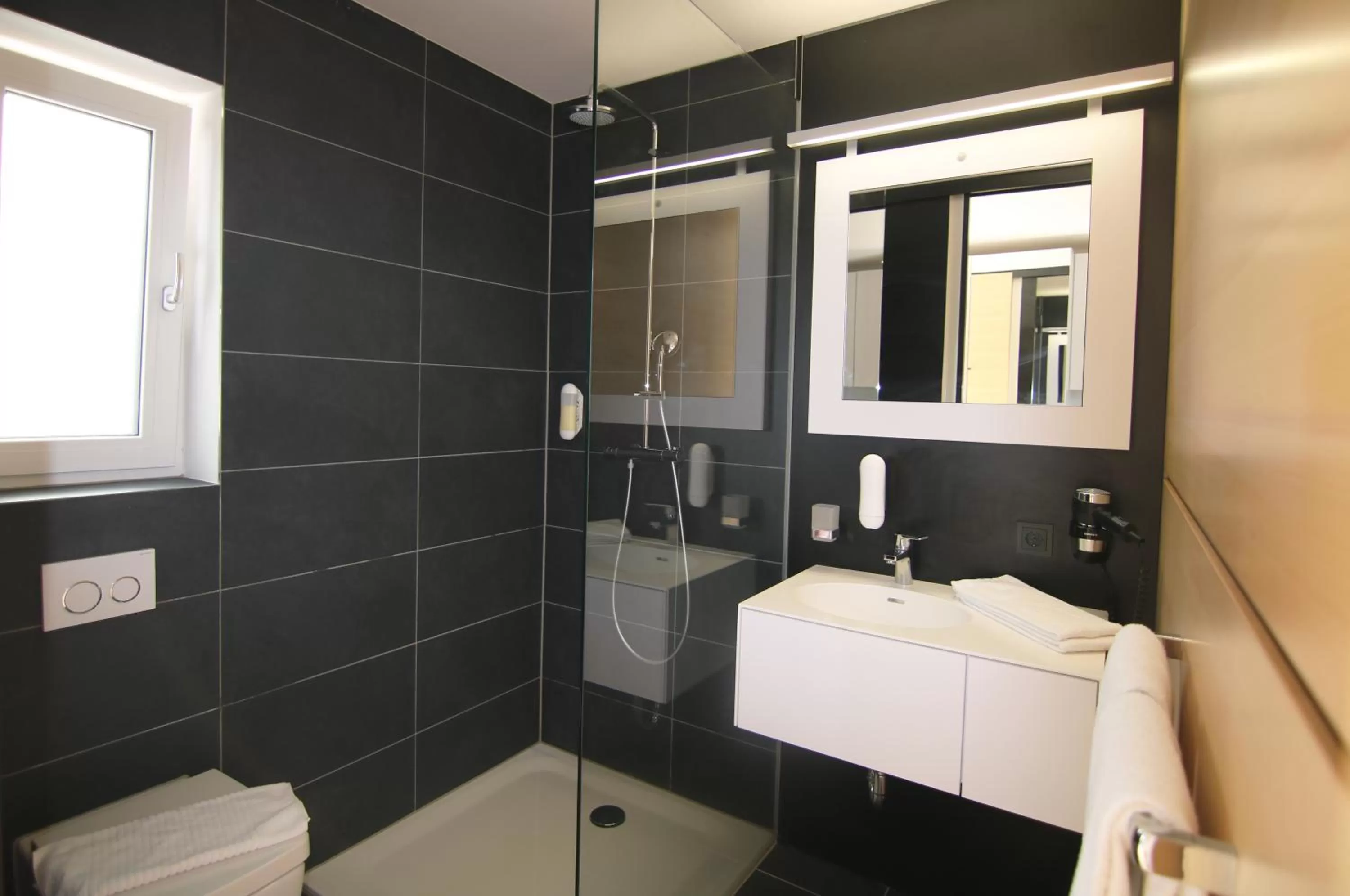 Bathroom in GA Hotel by WMM Hotels