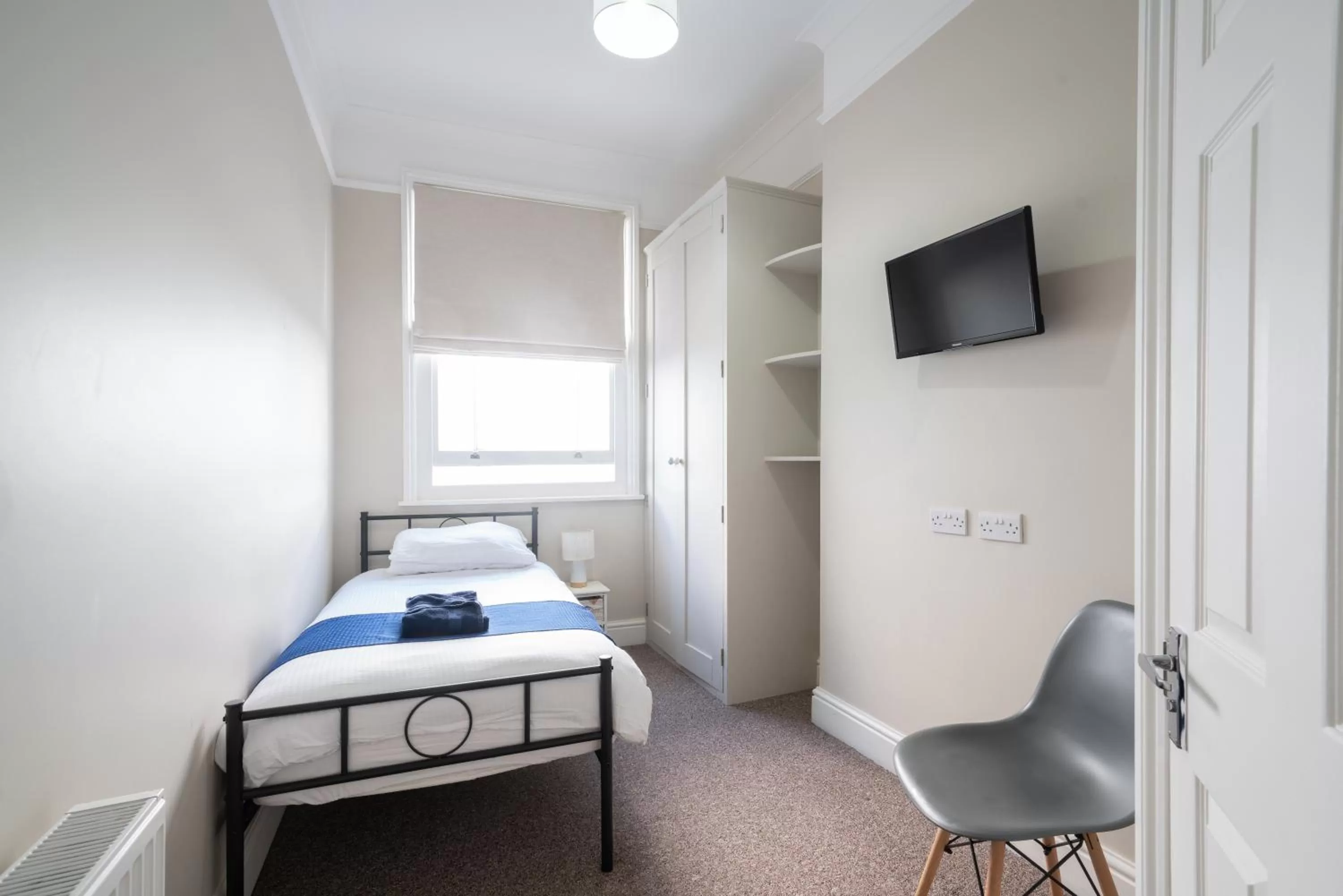 Bed in The Veteran Hotel & Bar