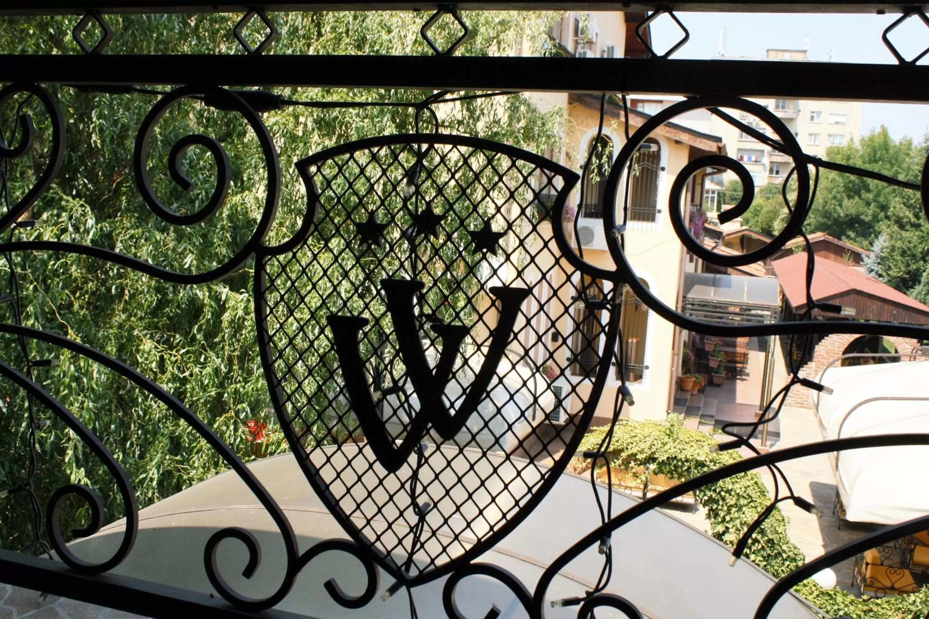 Property logo or sign in Hotel Villa Verde