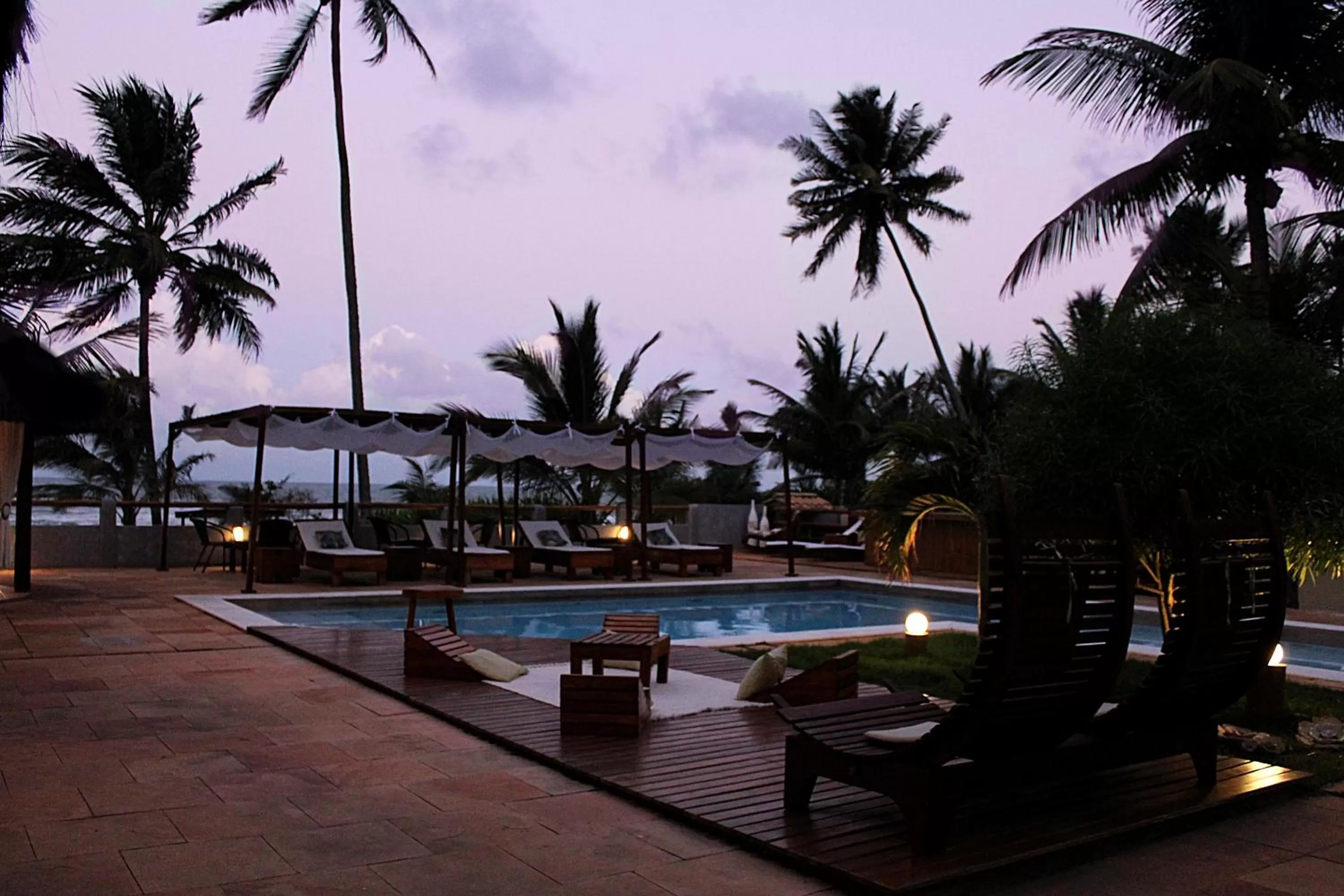 Garden, Swimming Pool in Pousada dos Hibiscus