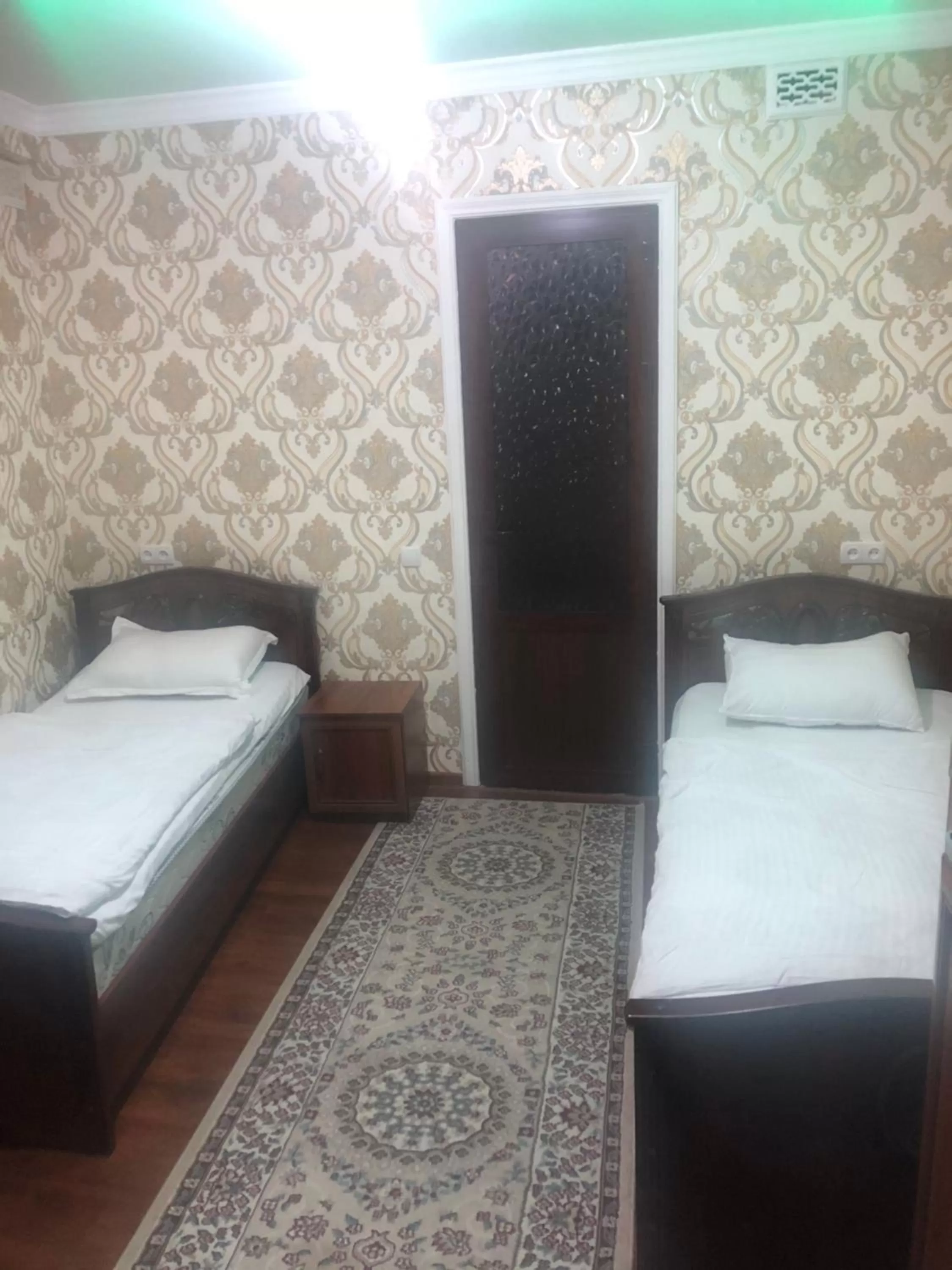 Bed in Tilyakori Hotel