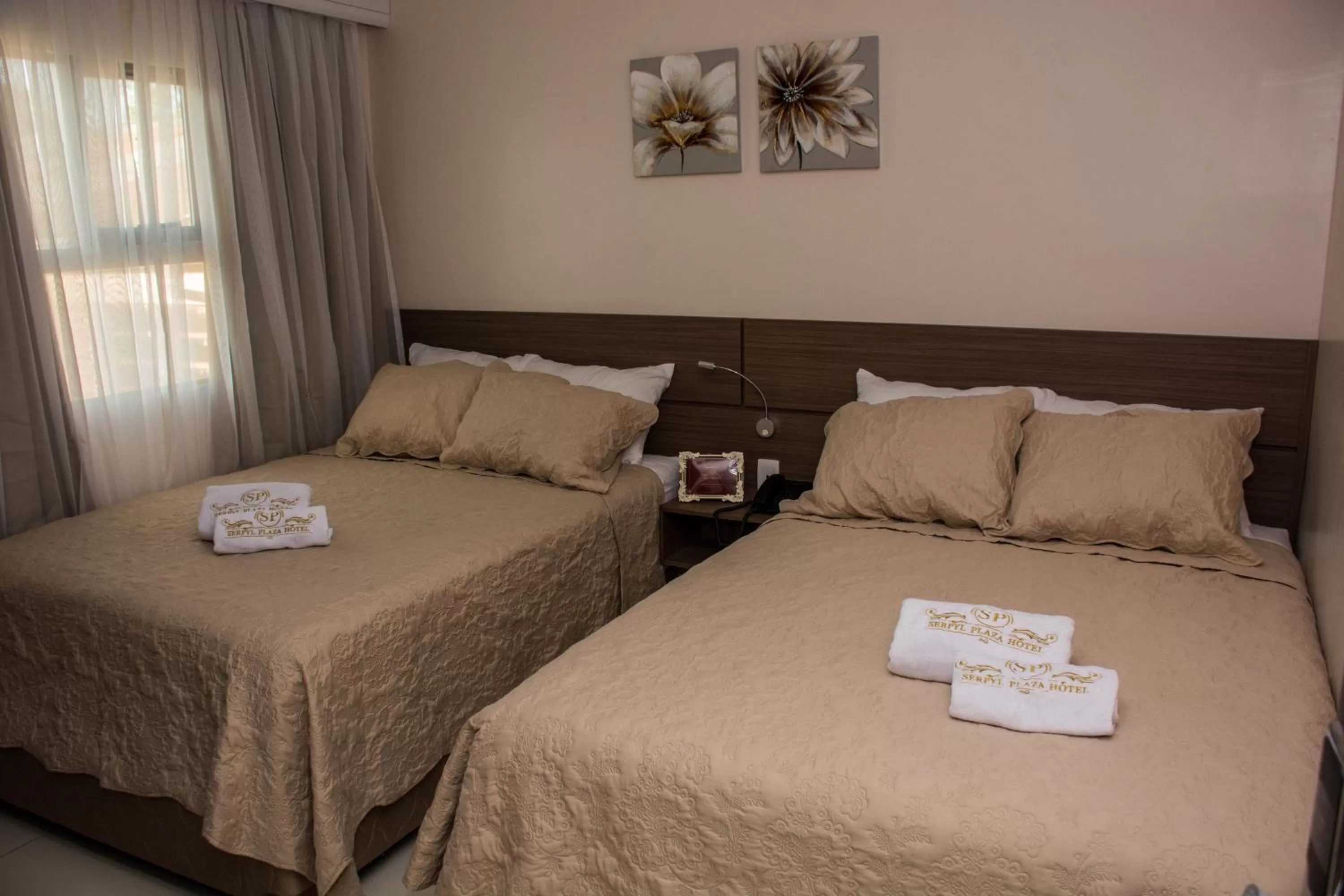 Bed in SERPYL Plaza Hotel