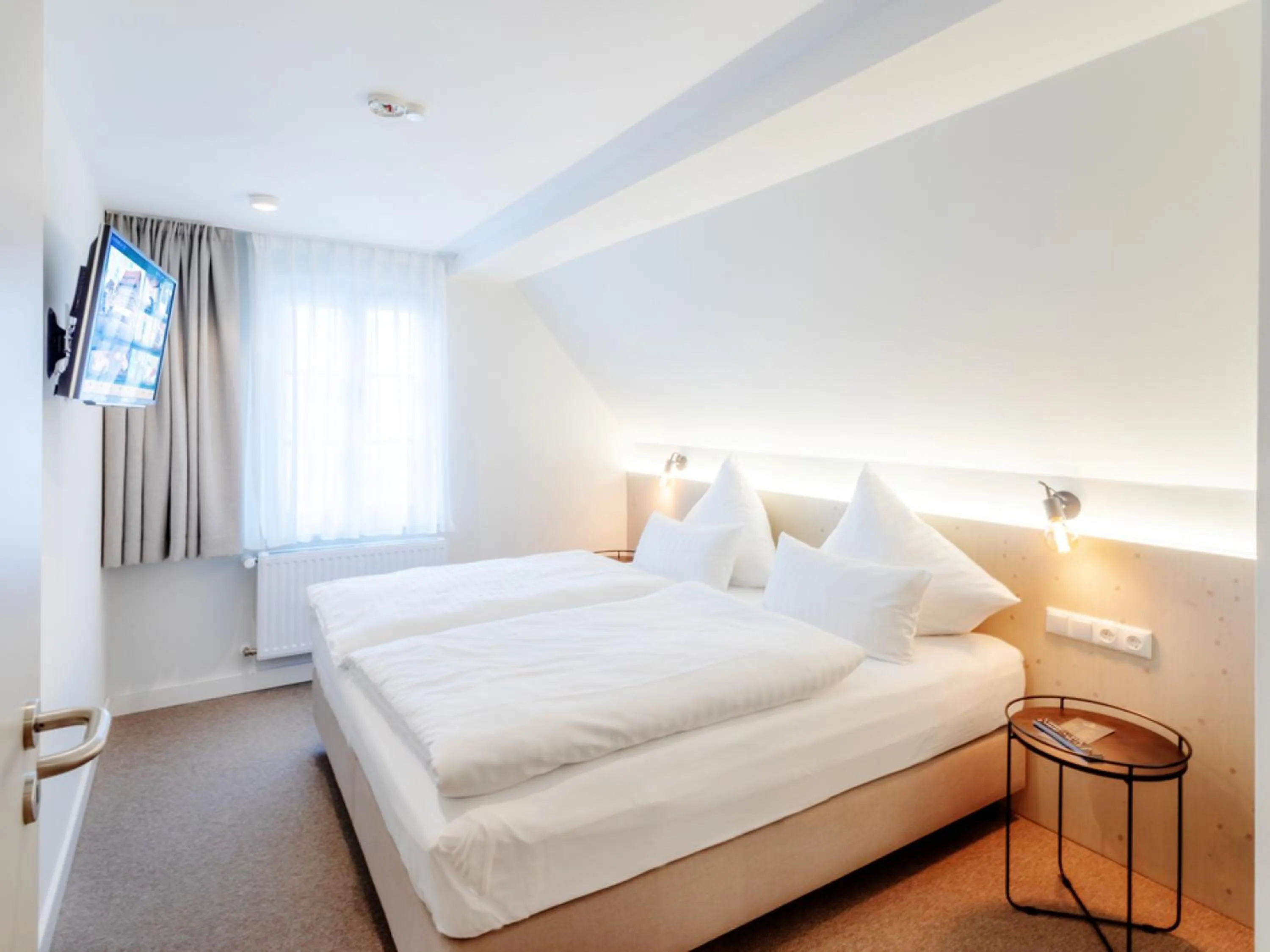 Bed in Hotel Tuchhaus