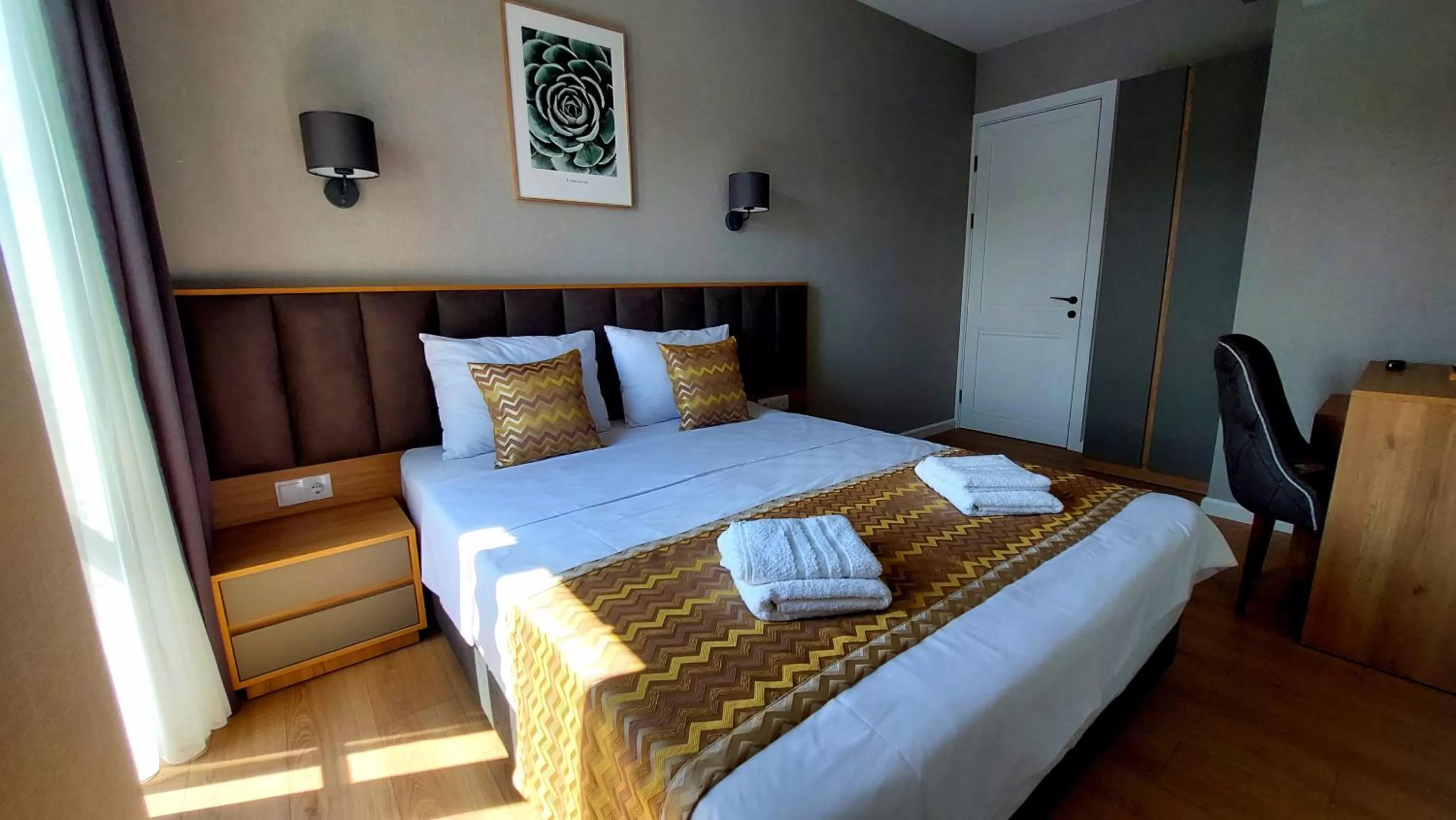 Photo of the whole room, Bed in Falcon Boutique Hotel