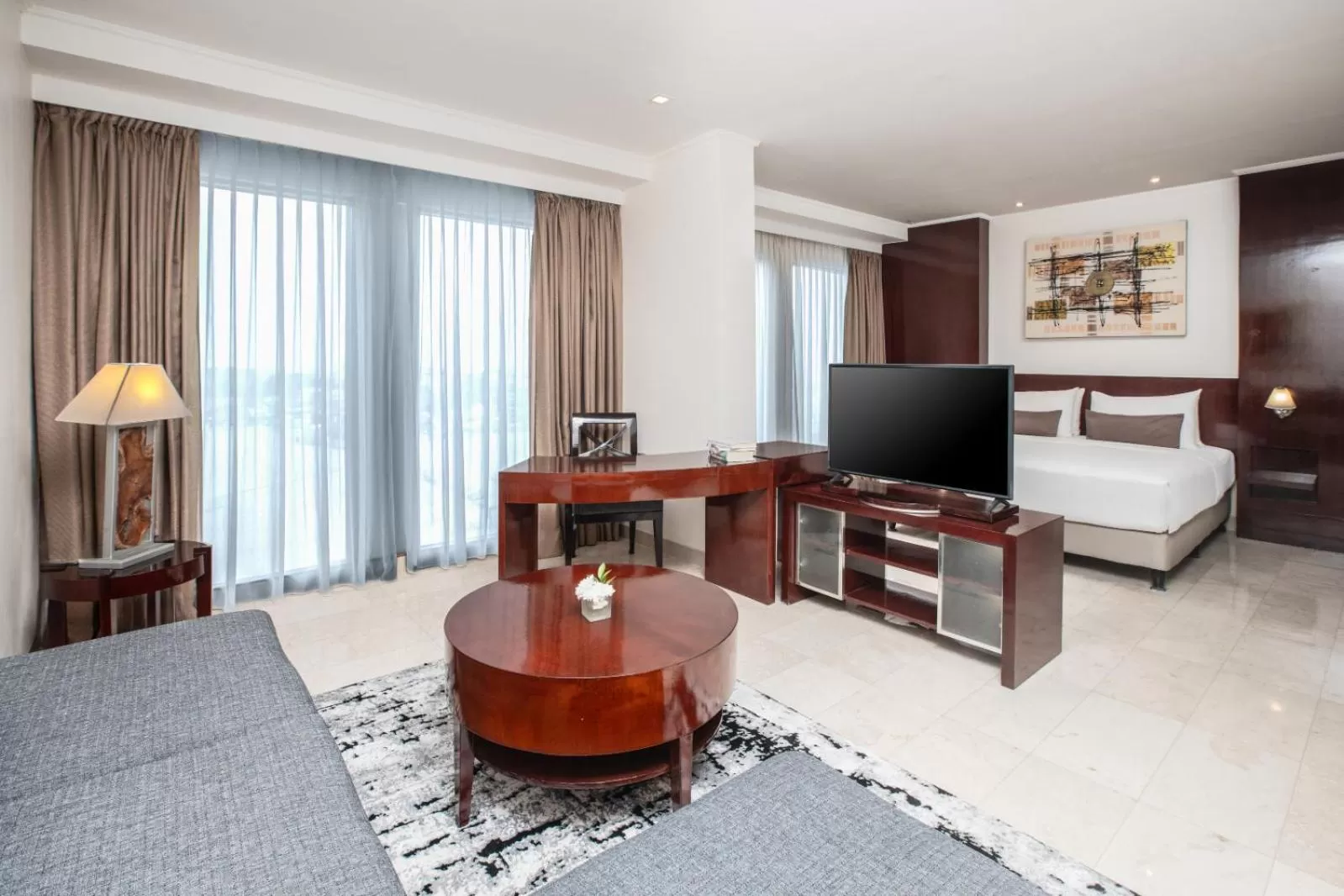 Living room, Bed in Aryaduta Palembang