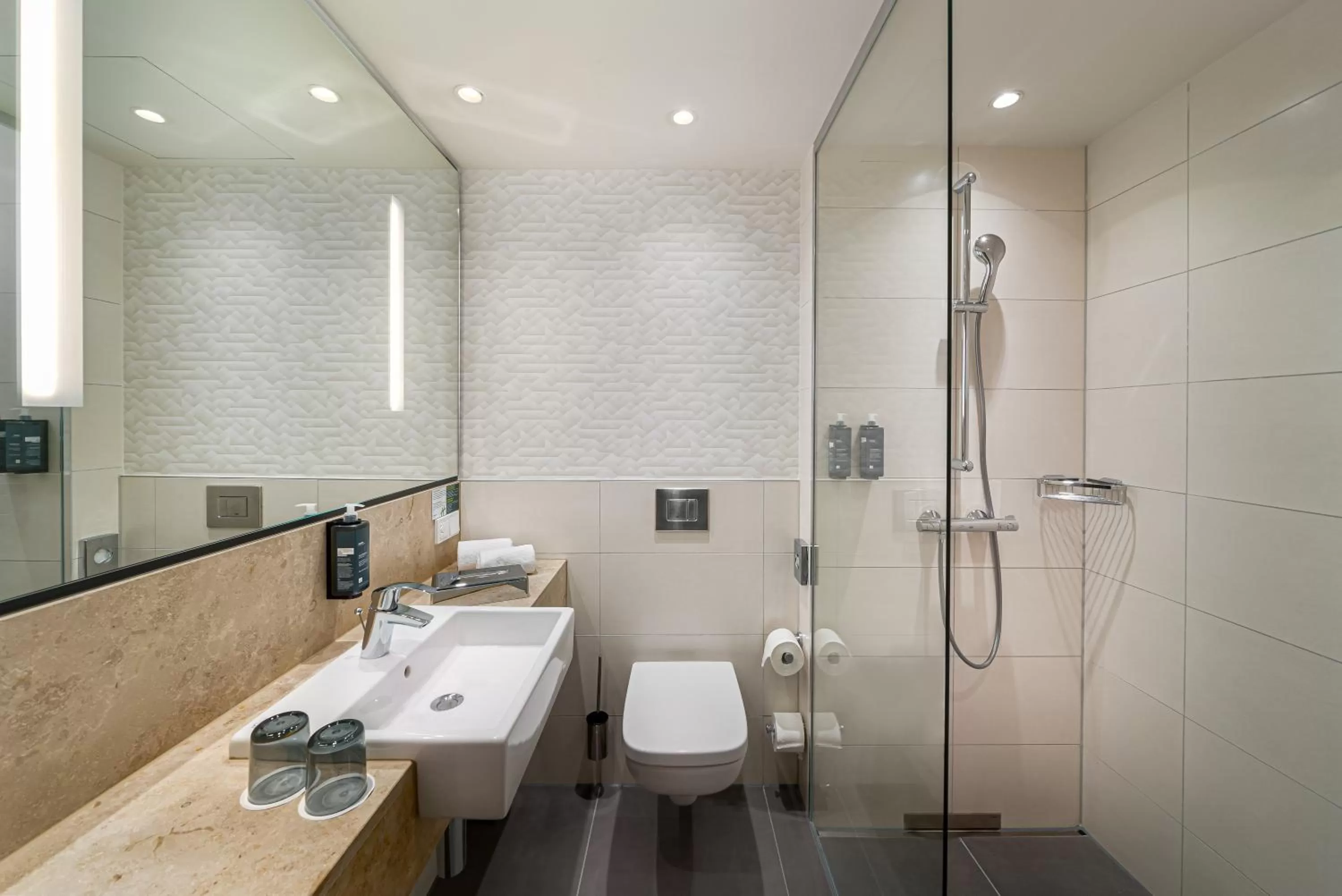 Bathroom in Holiday Inn - Mannheim City - Hauptbahnhof by IHG