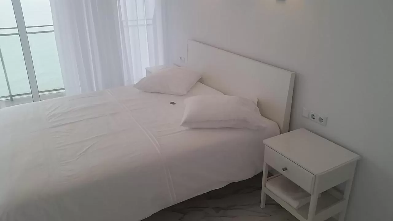 Bed in PURE WELLNESS SEA-VIEW Beluga & Dolphin Luxury HOTEL apartments