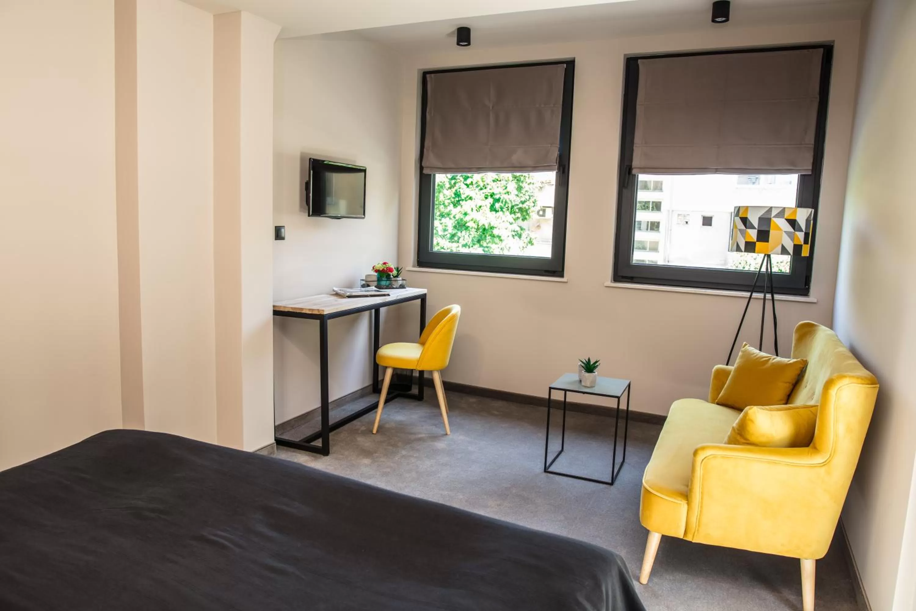 Bed in Reverence Boutique Hotel