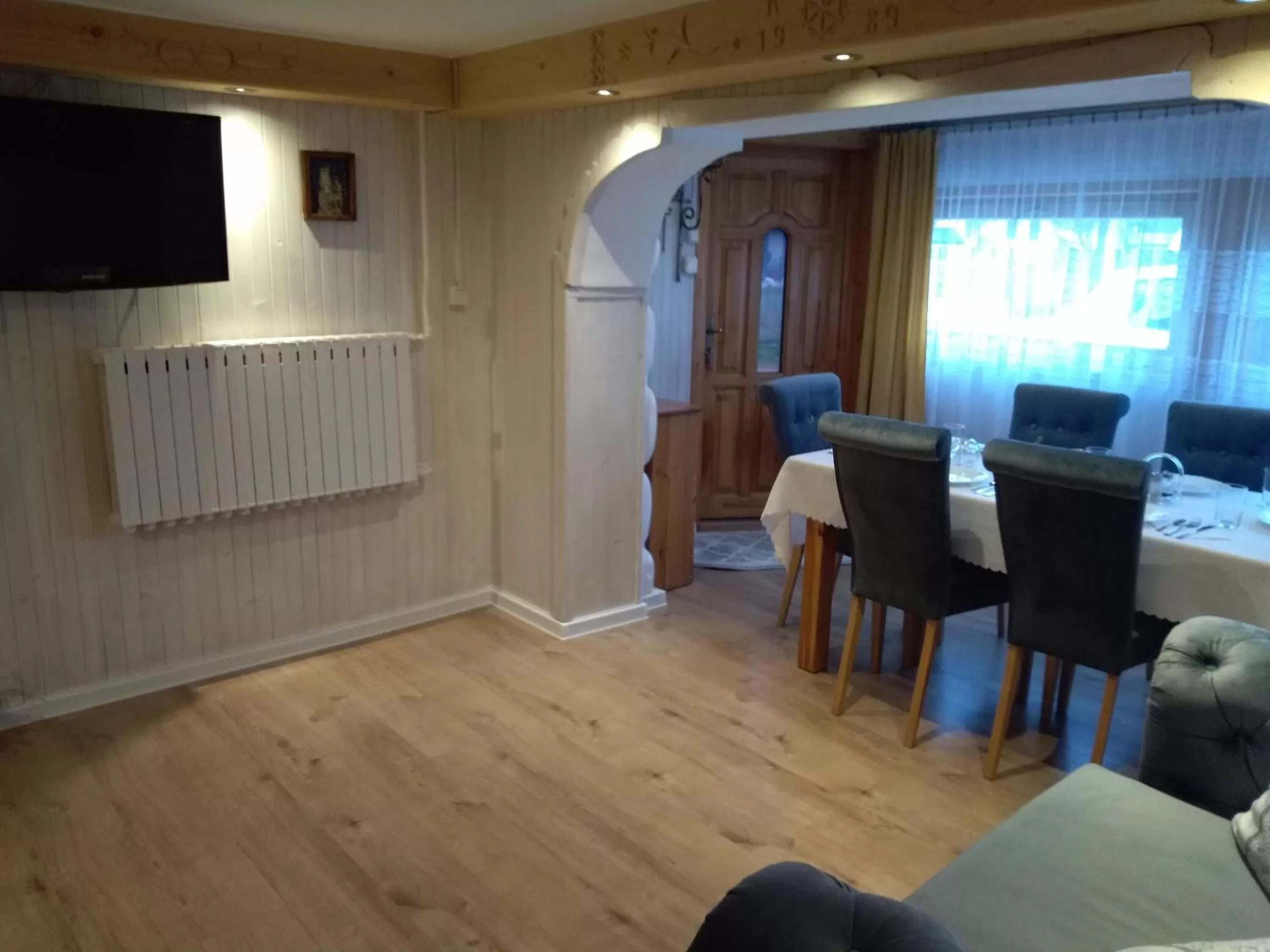 Communal lounge/ TV room in Noclegi U Reni