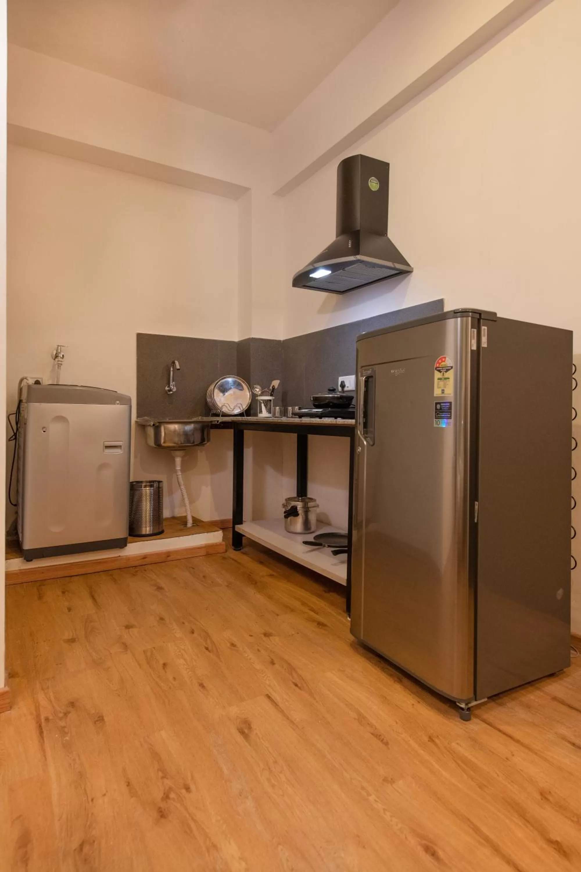 Kitchen/Kitchenette in Convastay Prestige- Near Apollo Hospital & US Consulate