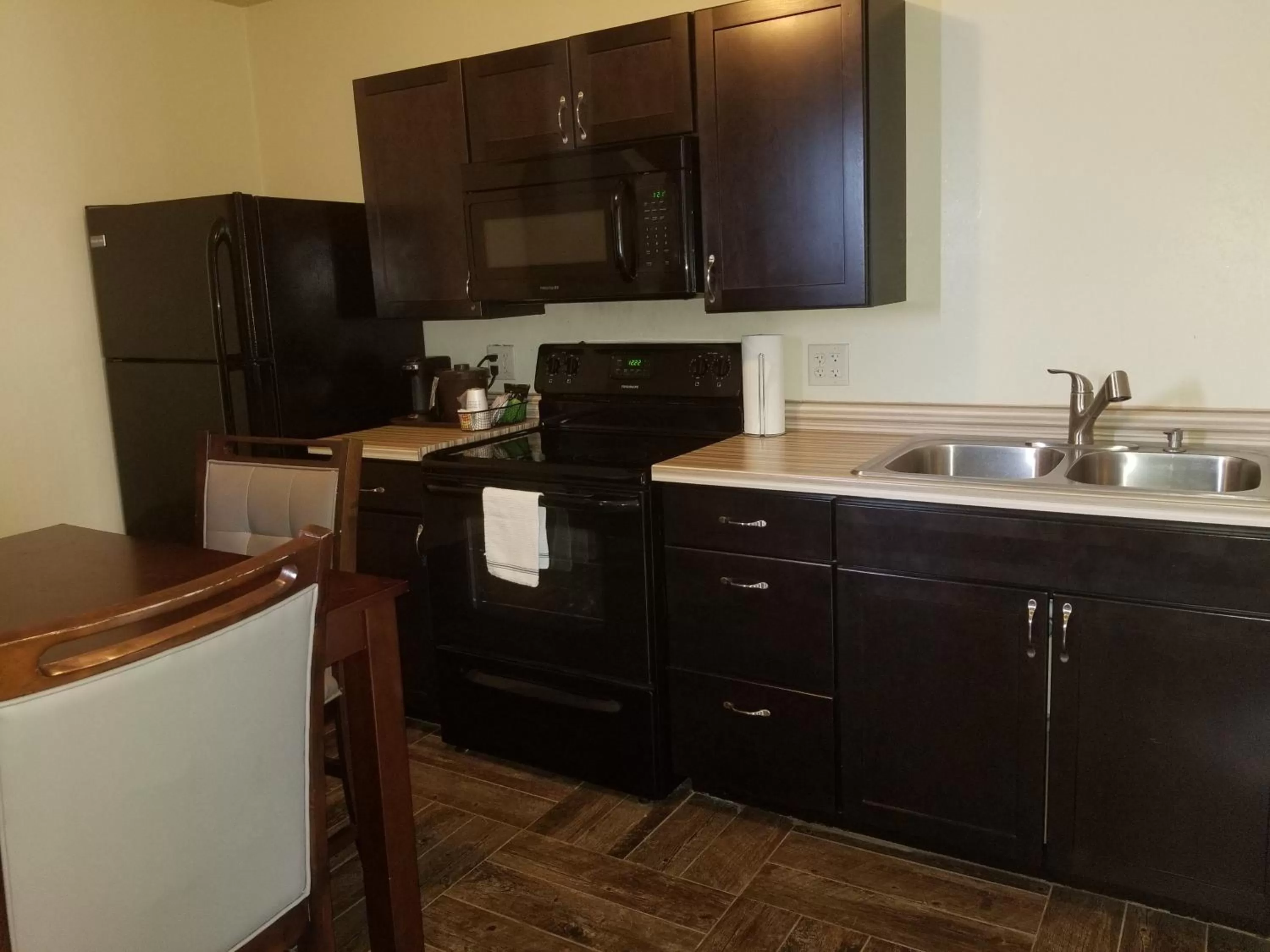 Kitchen or kitchenette in Baymont by Wyndham Eau Claire WI