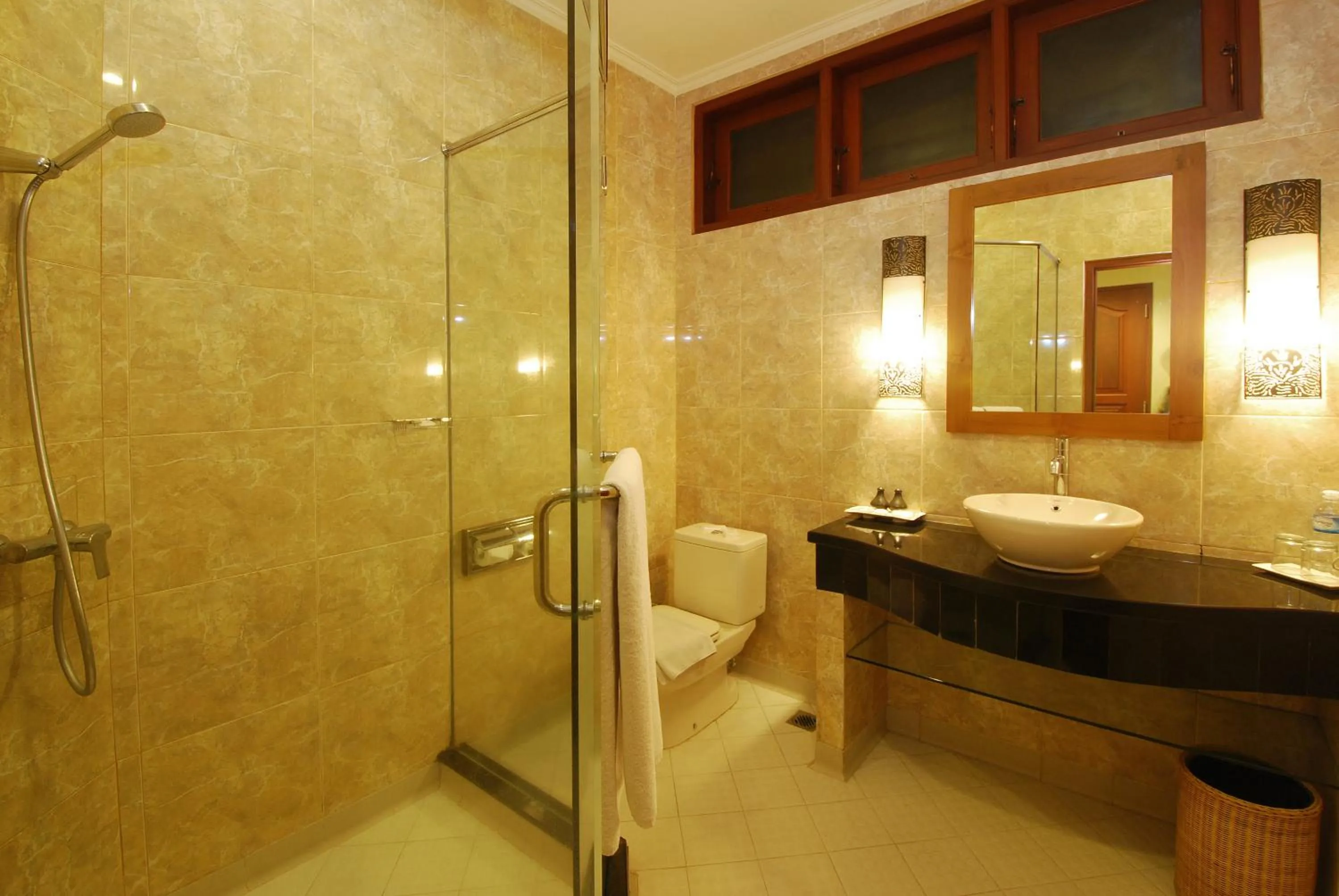 Bathroom in Yulia Beach Inn Kuta