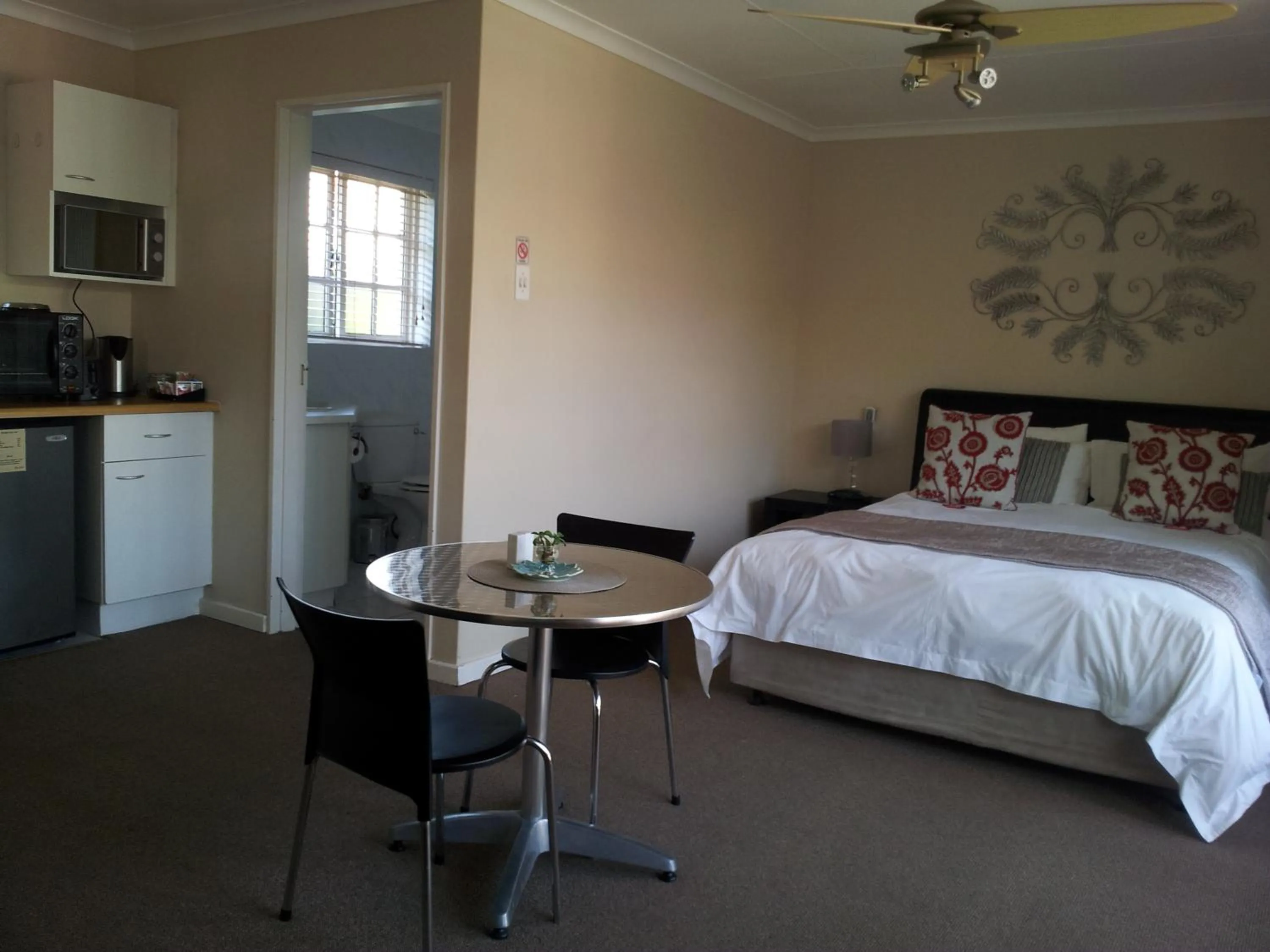 Bed in Palm Beach Guesthouse