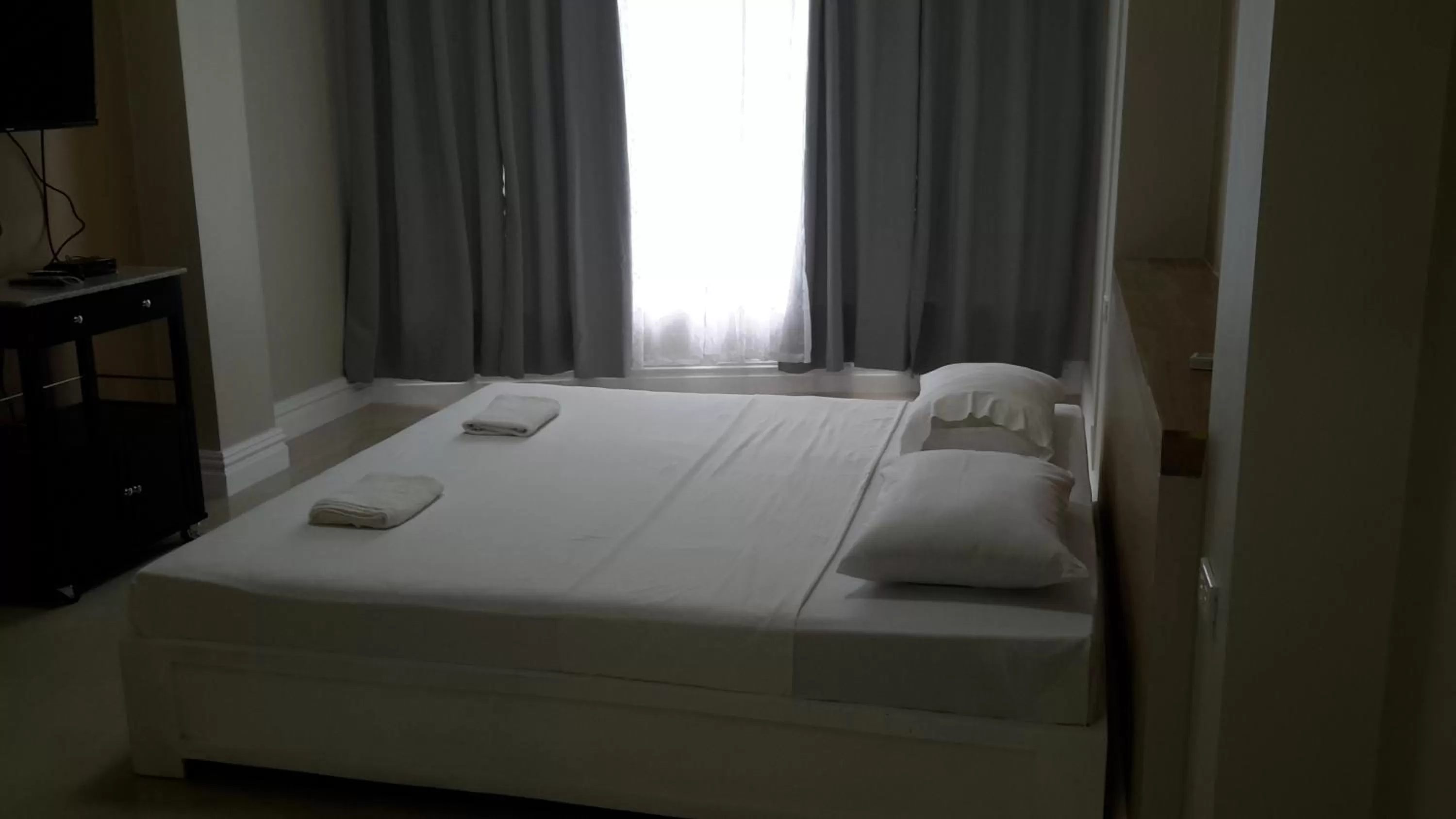 Bed in Sandscape Hotel