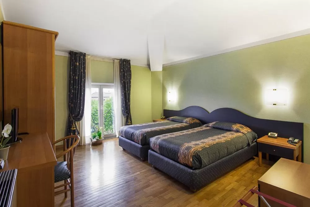 Bed in Hotel Gambara