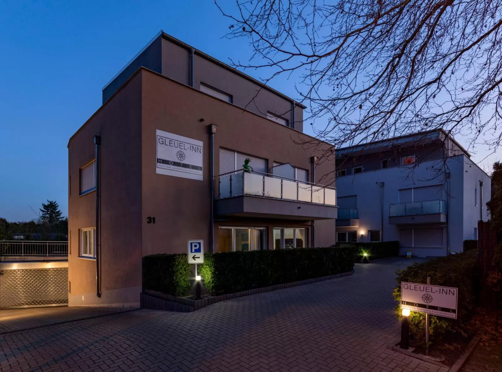 Property Building in GLEUEL INN - digital hotel & serviced apartments & boardinghouse mit voll ausgestatteten Küchen