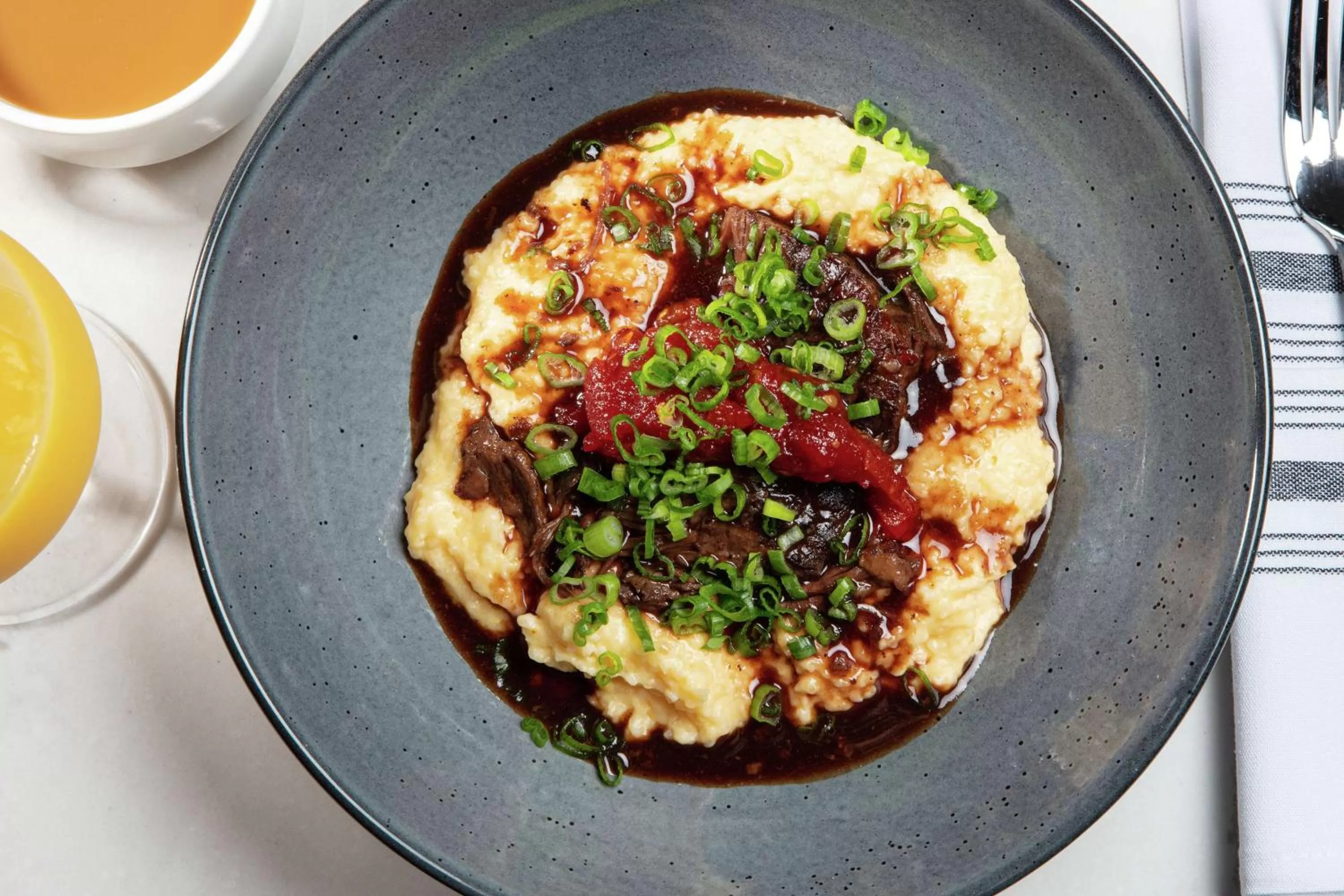 Dining area in The Higgins Hotel New Orleans, Curio Collection by Hilton