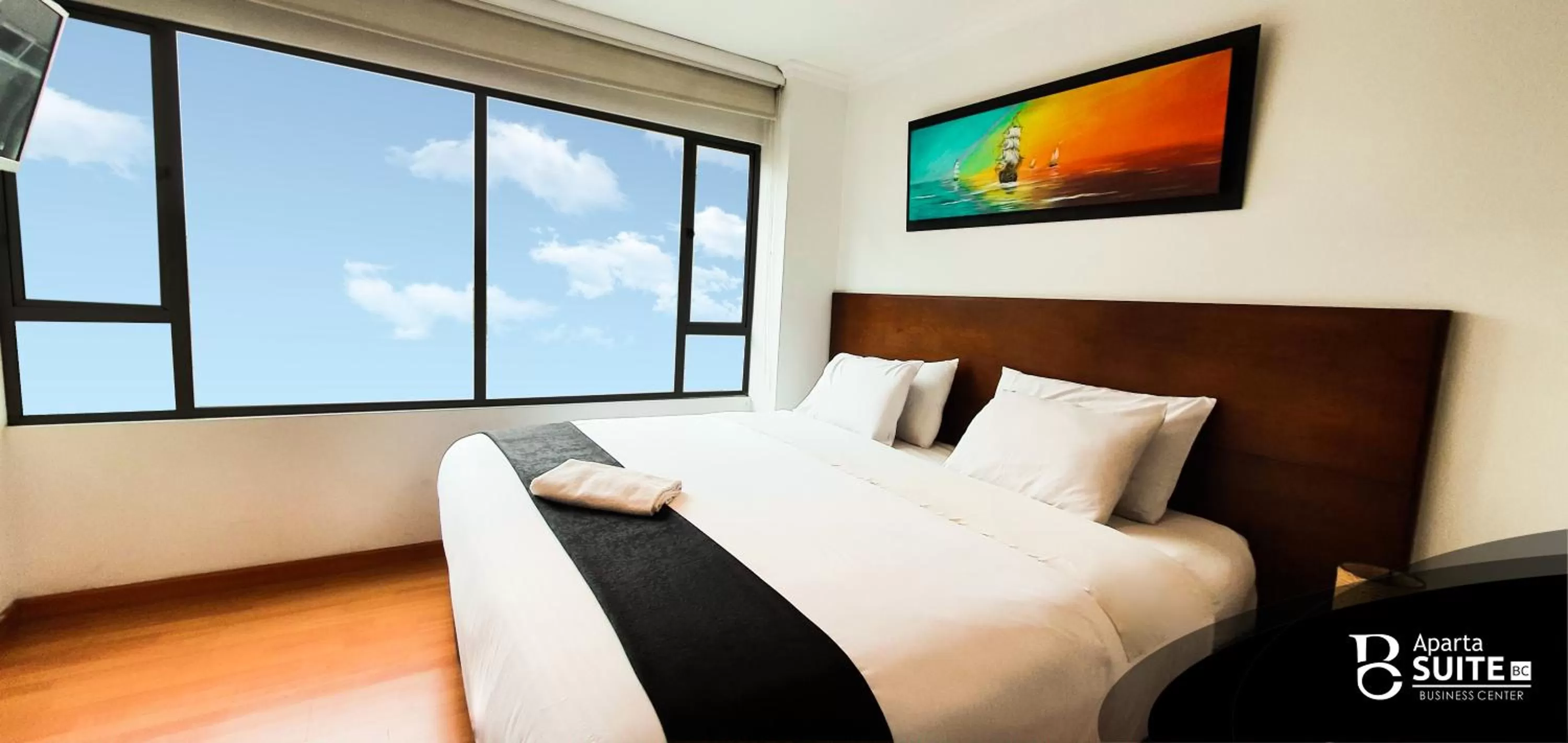 Bed in Apartasuites Plaza Modelia