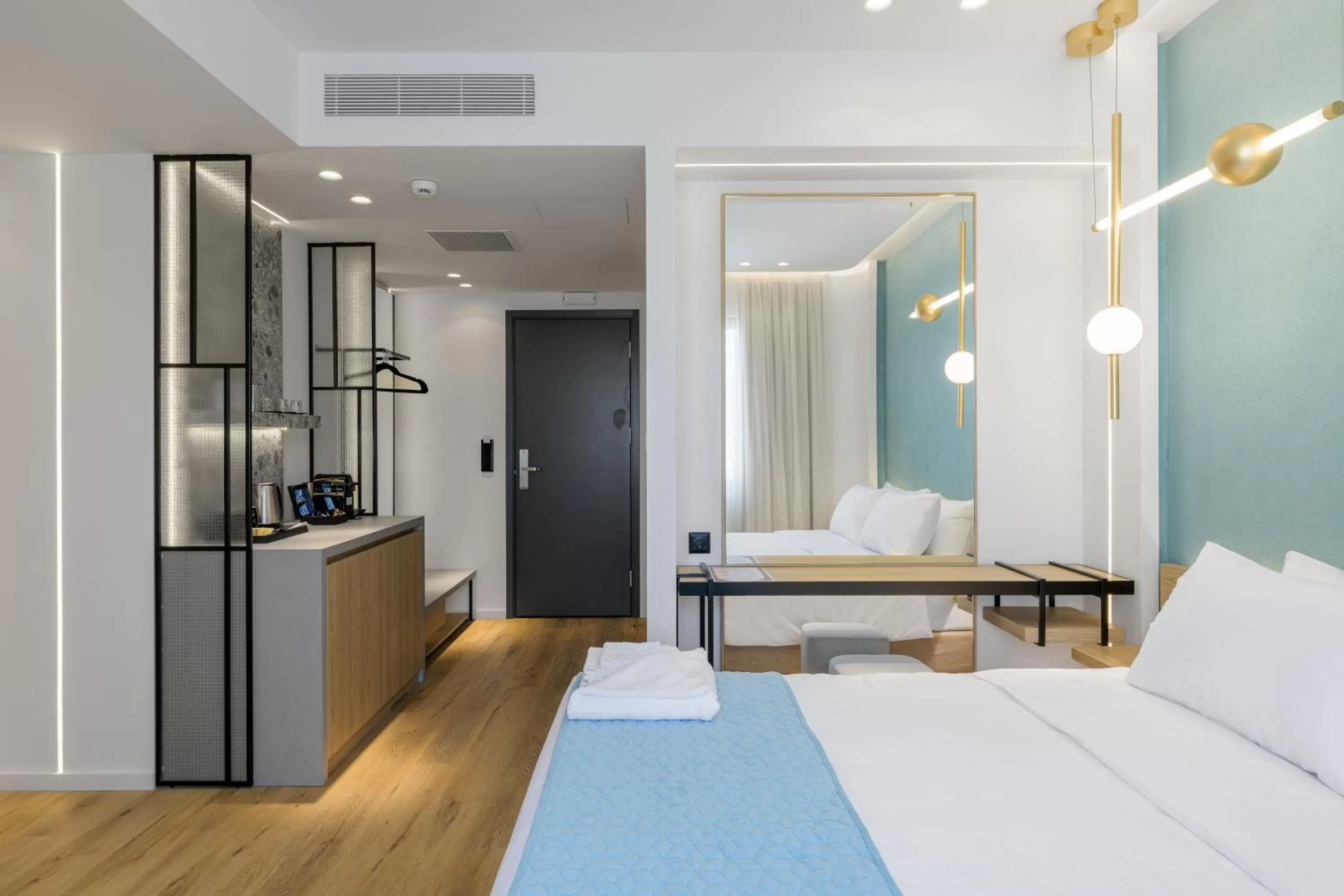 Bed in Acropolis Magenta Luxury Suites