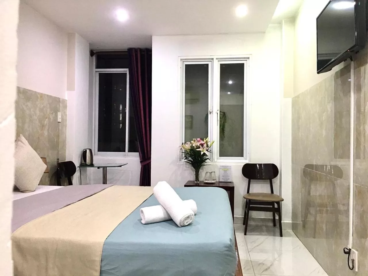 Bed in SaiGon CoZy Hotel "241 Pham Ngu Lao Street''