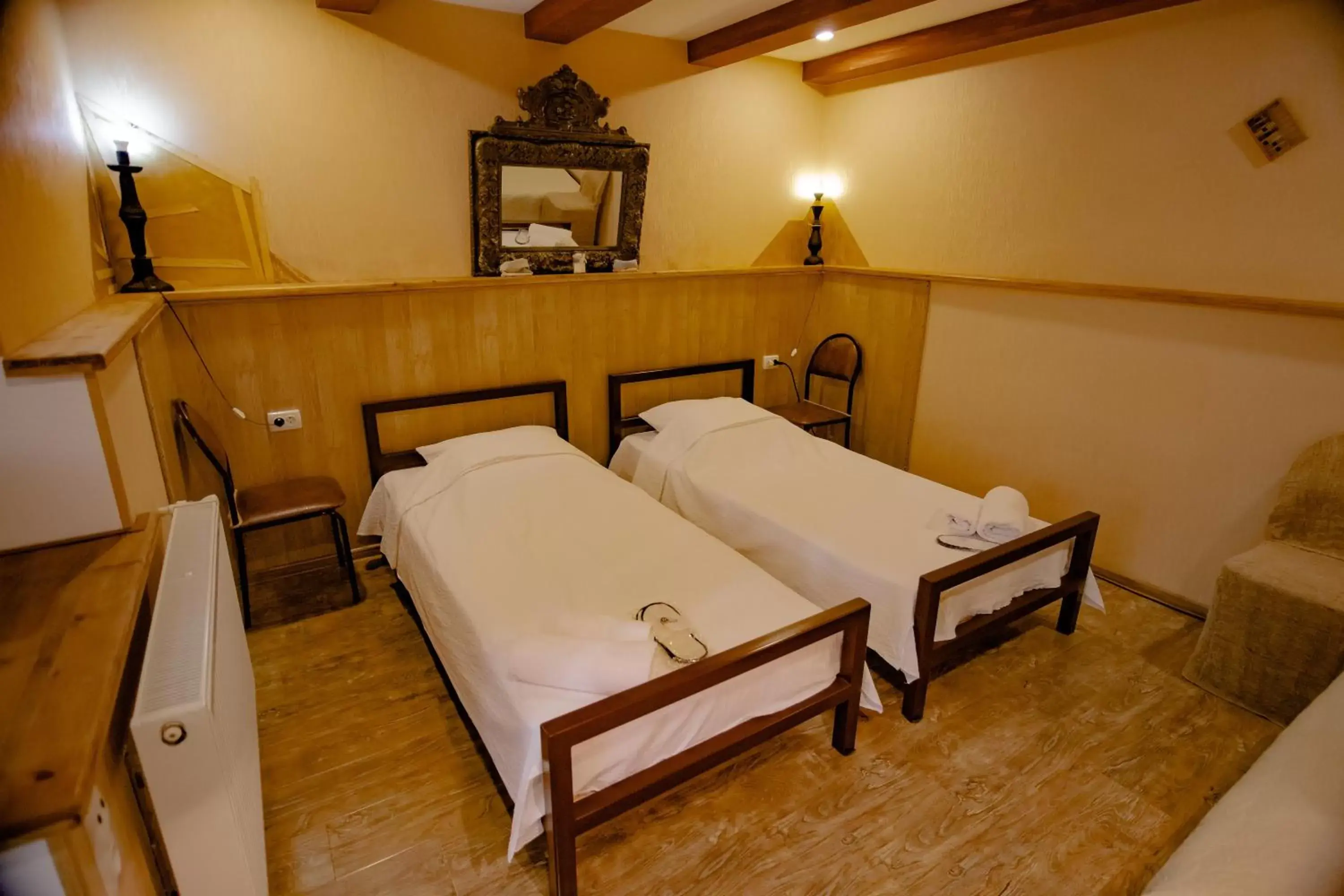 Basic Triple Room in Qilimcha's Guesthouse Basic Triple Room in Qilimcha's Guesthouse